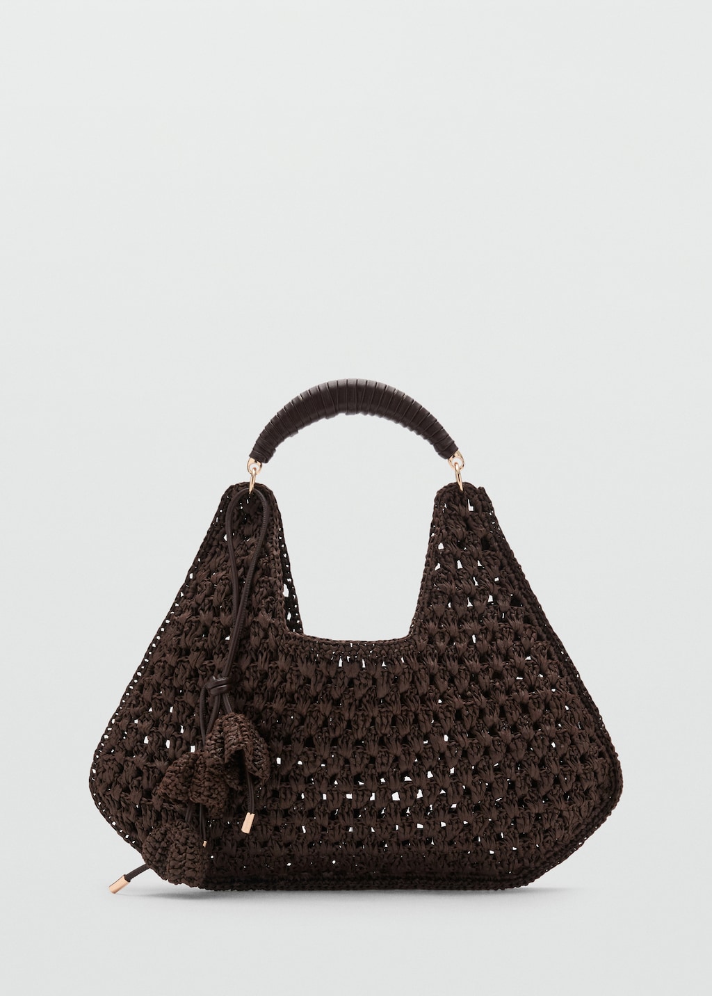 Natural fiber shoulder bag with flower charm