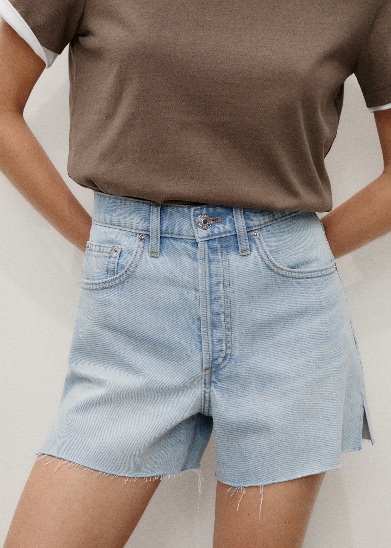 Denim shorts with frayed hem