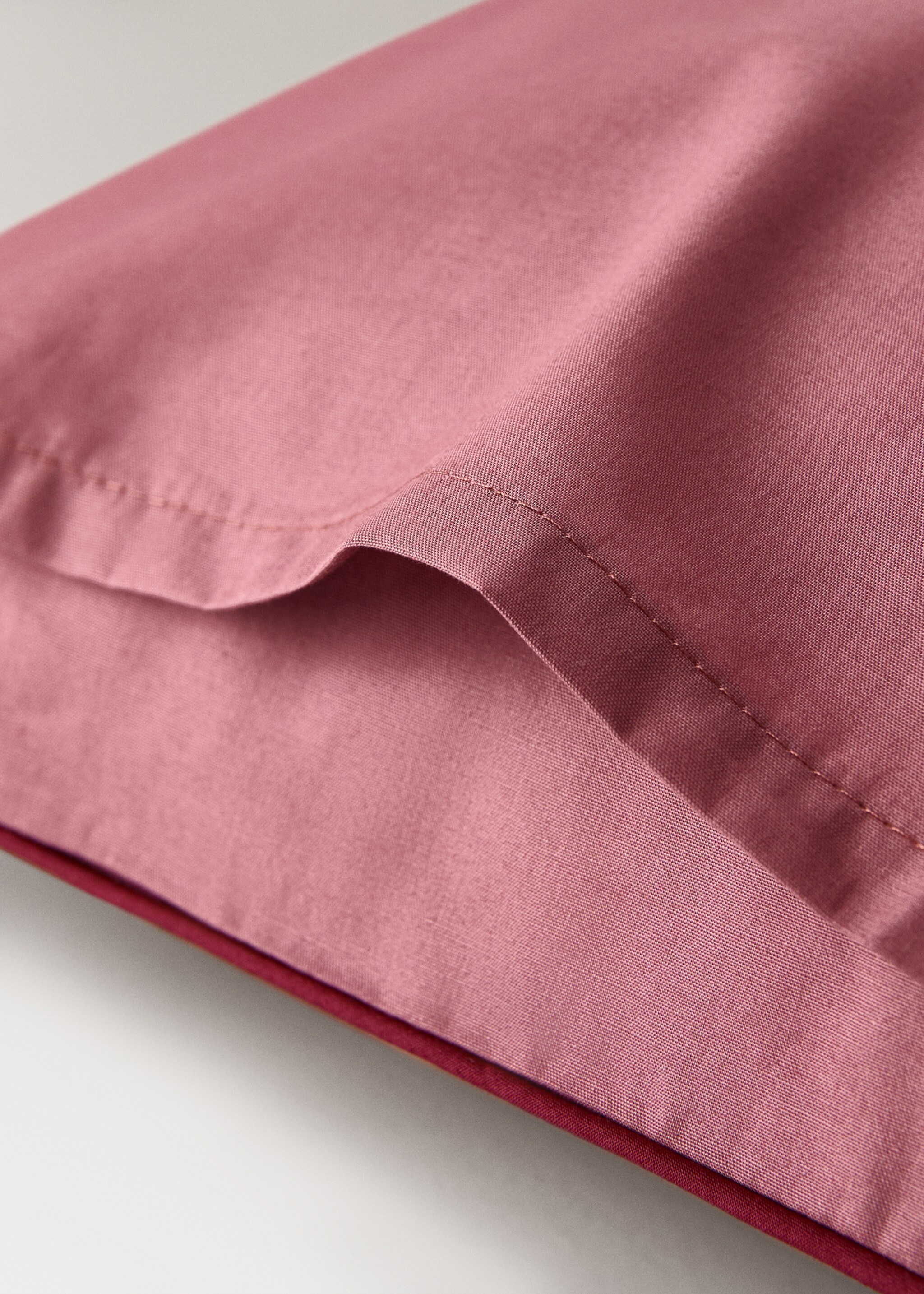 Reversible percale cotton pillowcase with contrasting piping 30x50 cm - Details of the article 1, Pink. Ref: 17061545-00.