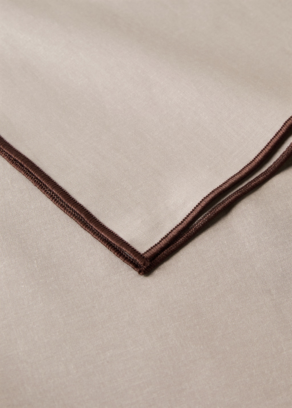 Resin-coated cotton tablecloth with overlock stitching for 8 to 10 diners