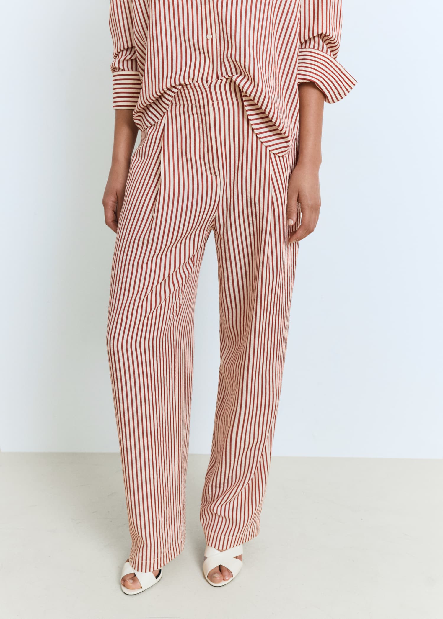 Pleated striped pants - Women | MANGO USA