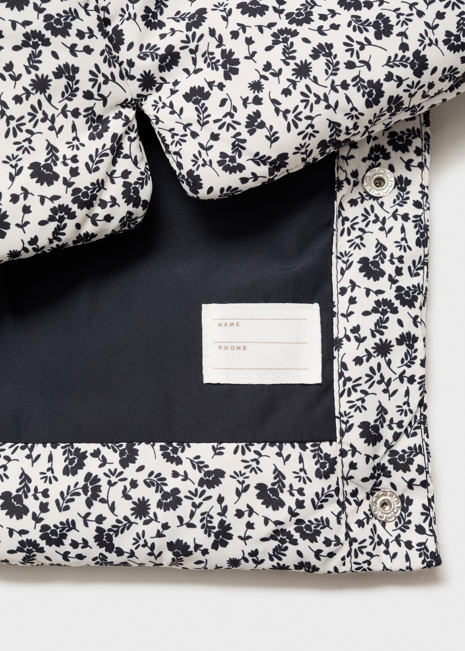 Gilet matelassé à fleurs - Détail de l'article 0