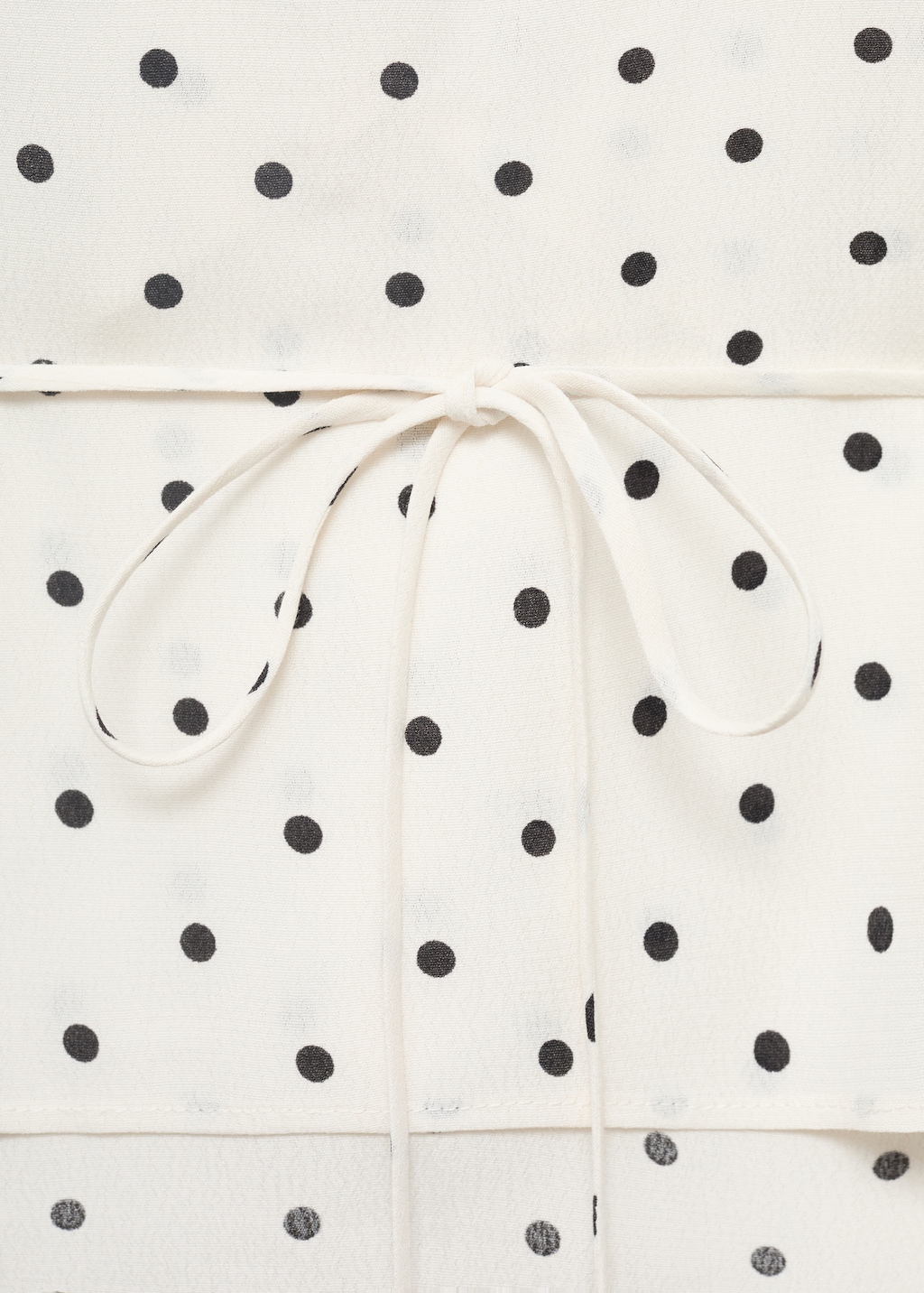 Polka-dot blouse with ruffles