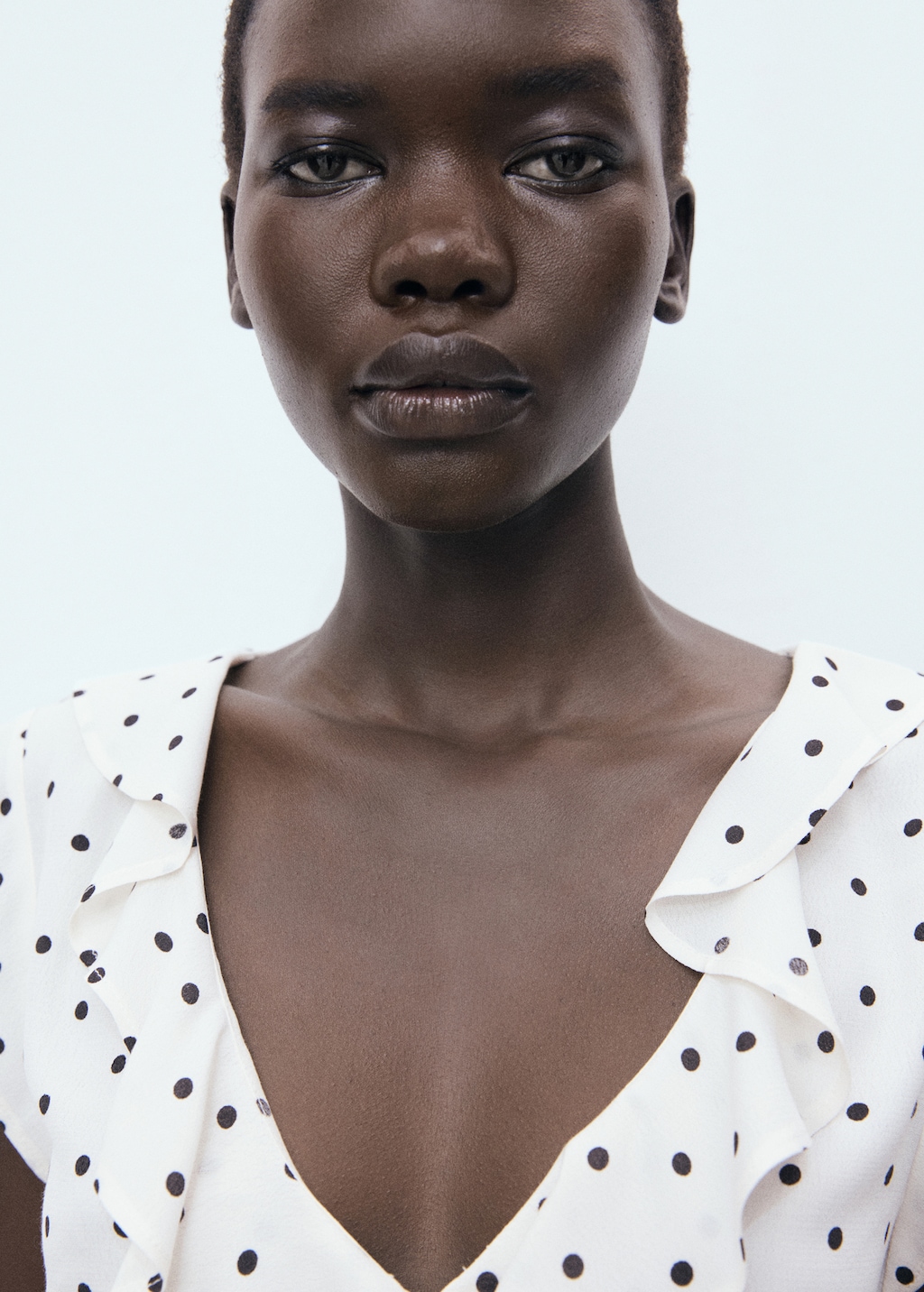 Polka-dot blouse with ruffles