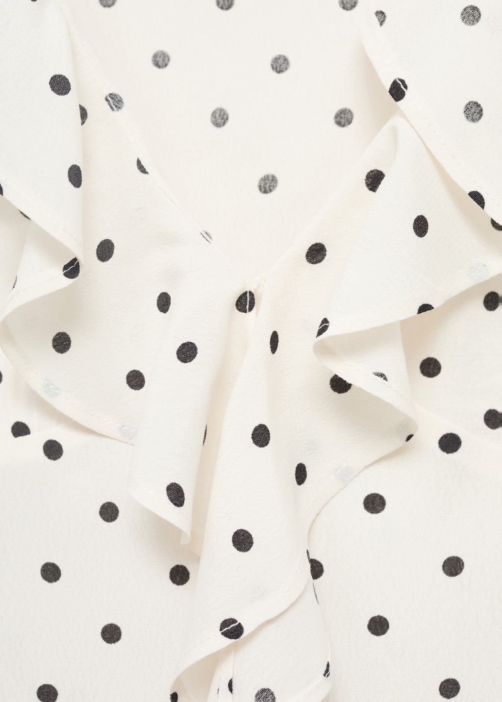 Polka-dot blouse with ruffles