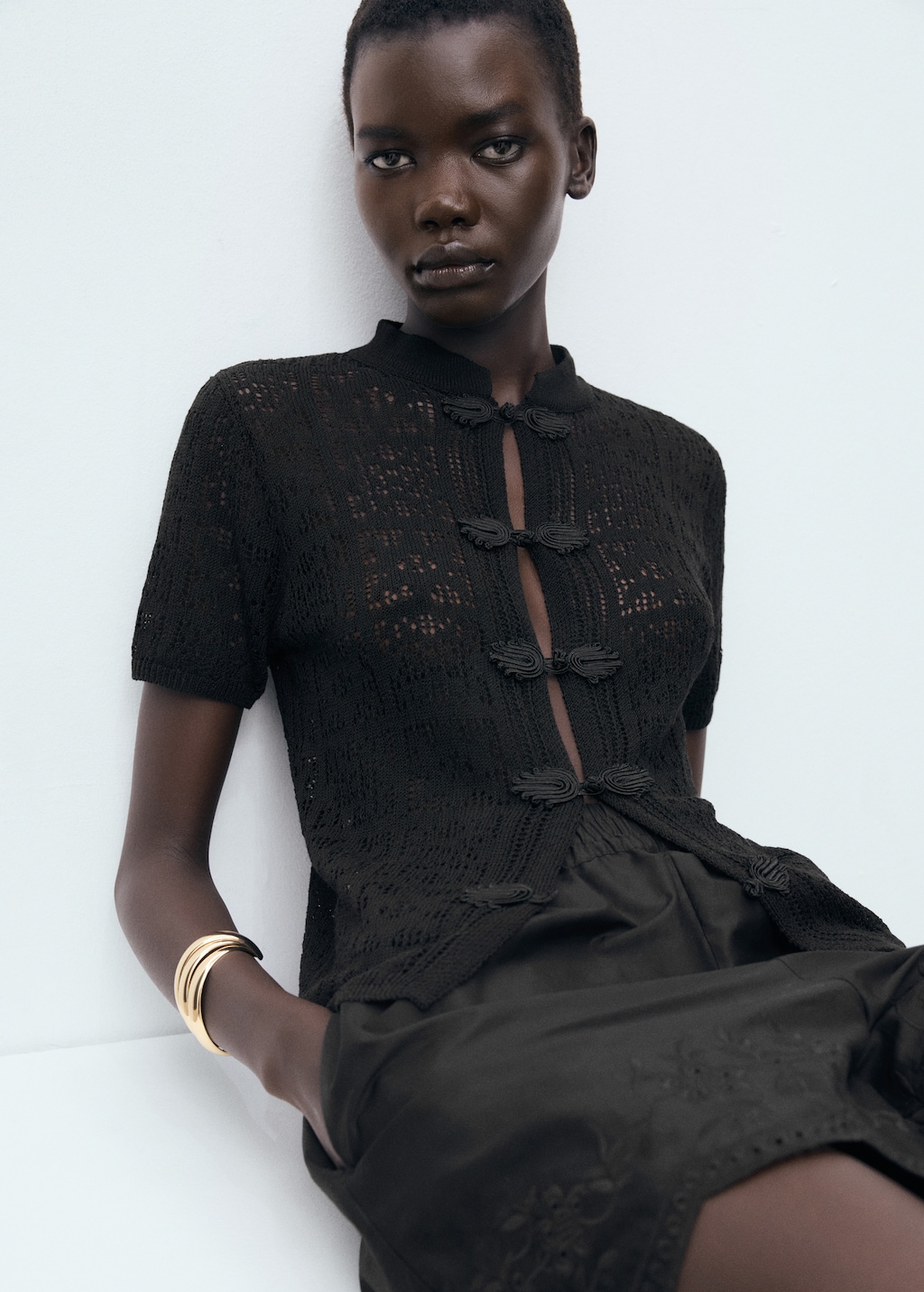 Crochet cardigan with toggle buttons