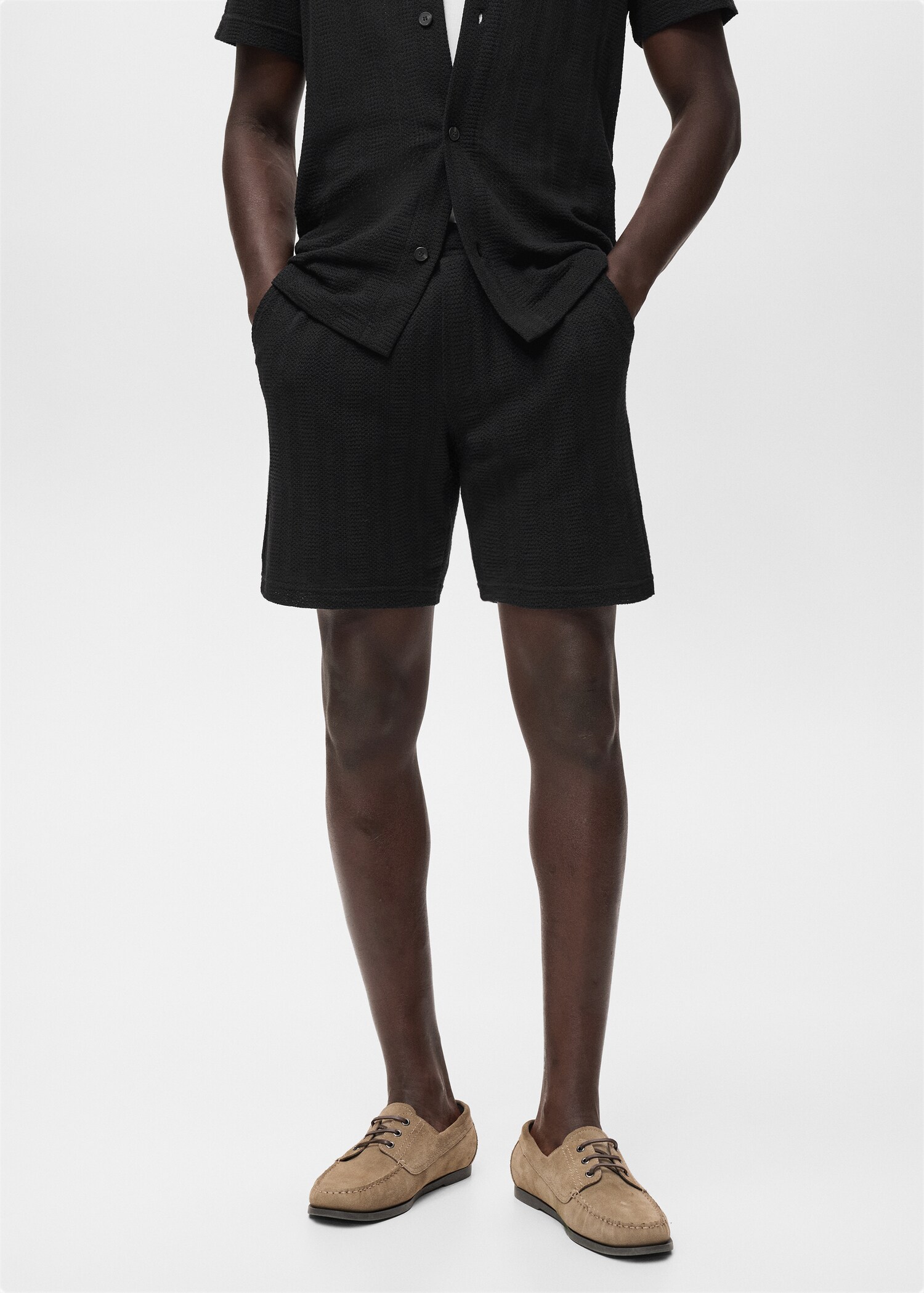 Structured knitted shorts - Medium plane