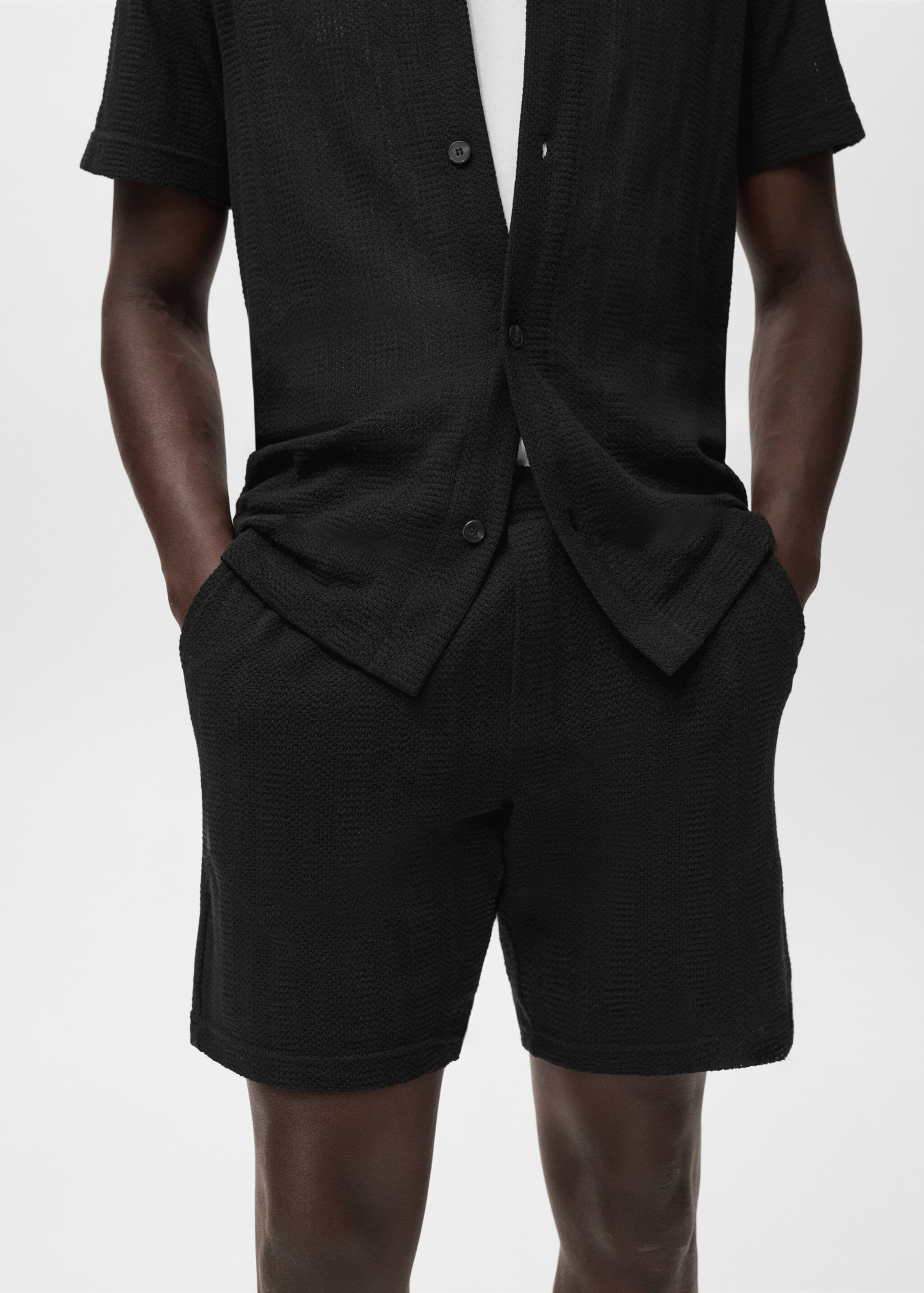 Structured knitted shorts - Details of the article 1, Black. Ref: 17062923-00.
