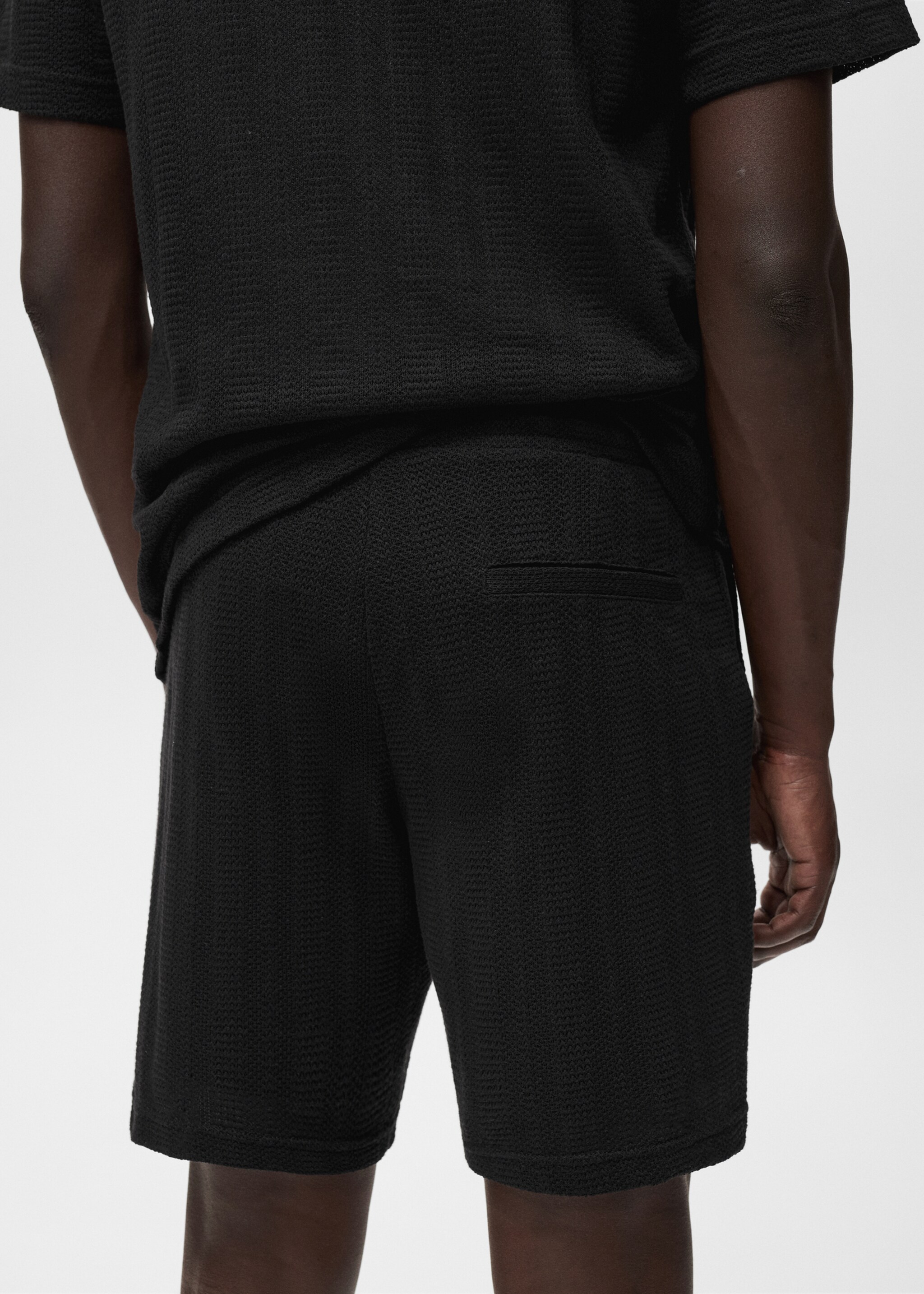 Structured knitted shorts - Details of the article 6, Black. Ref: 17062923-00.