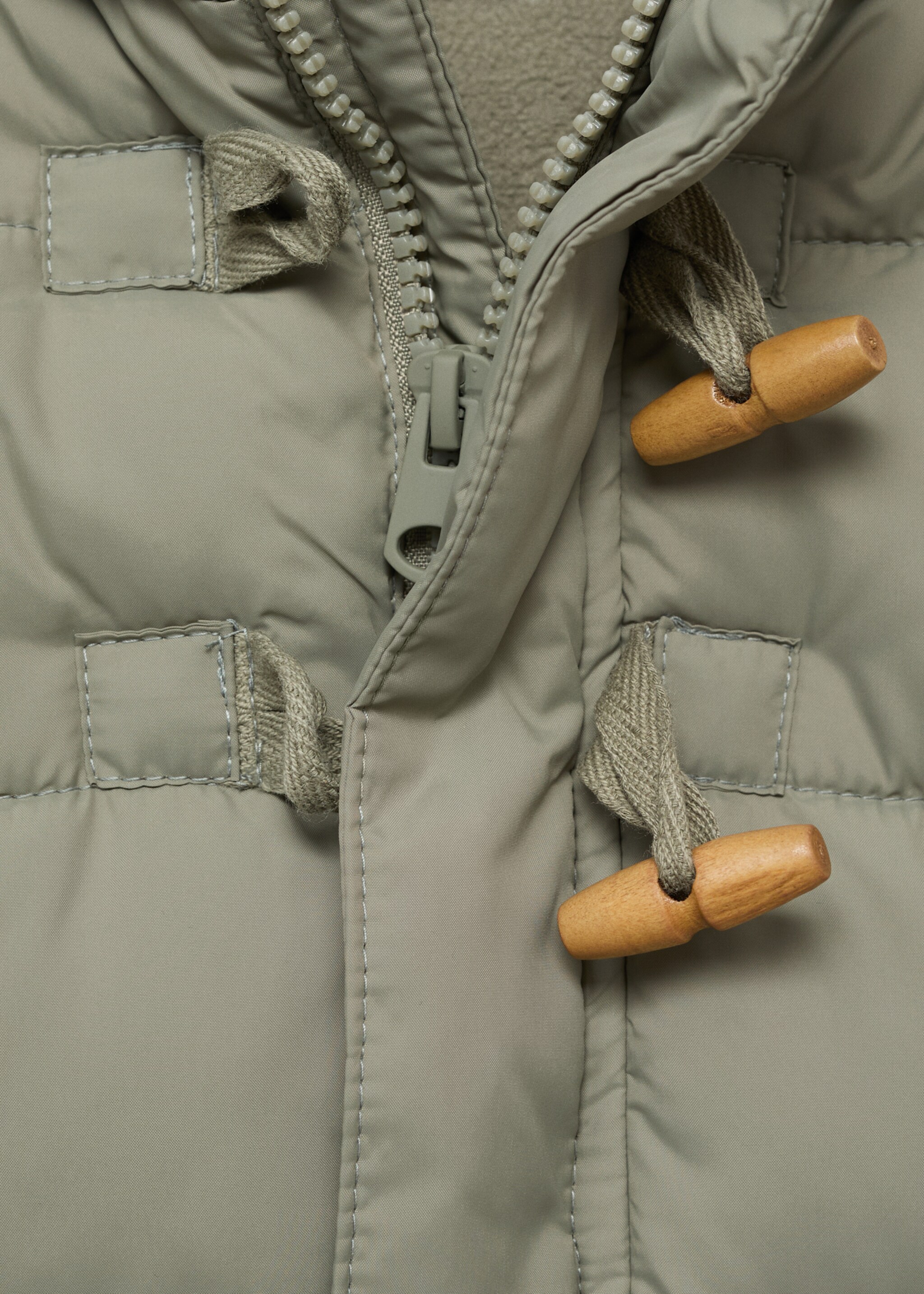 Quilted buttoned coat - Details of the article 8, Pastel Green. Ref: 17063272-00.