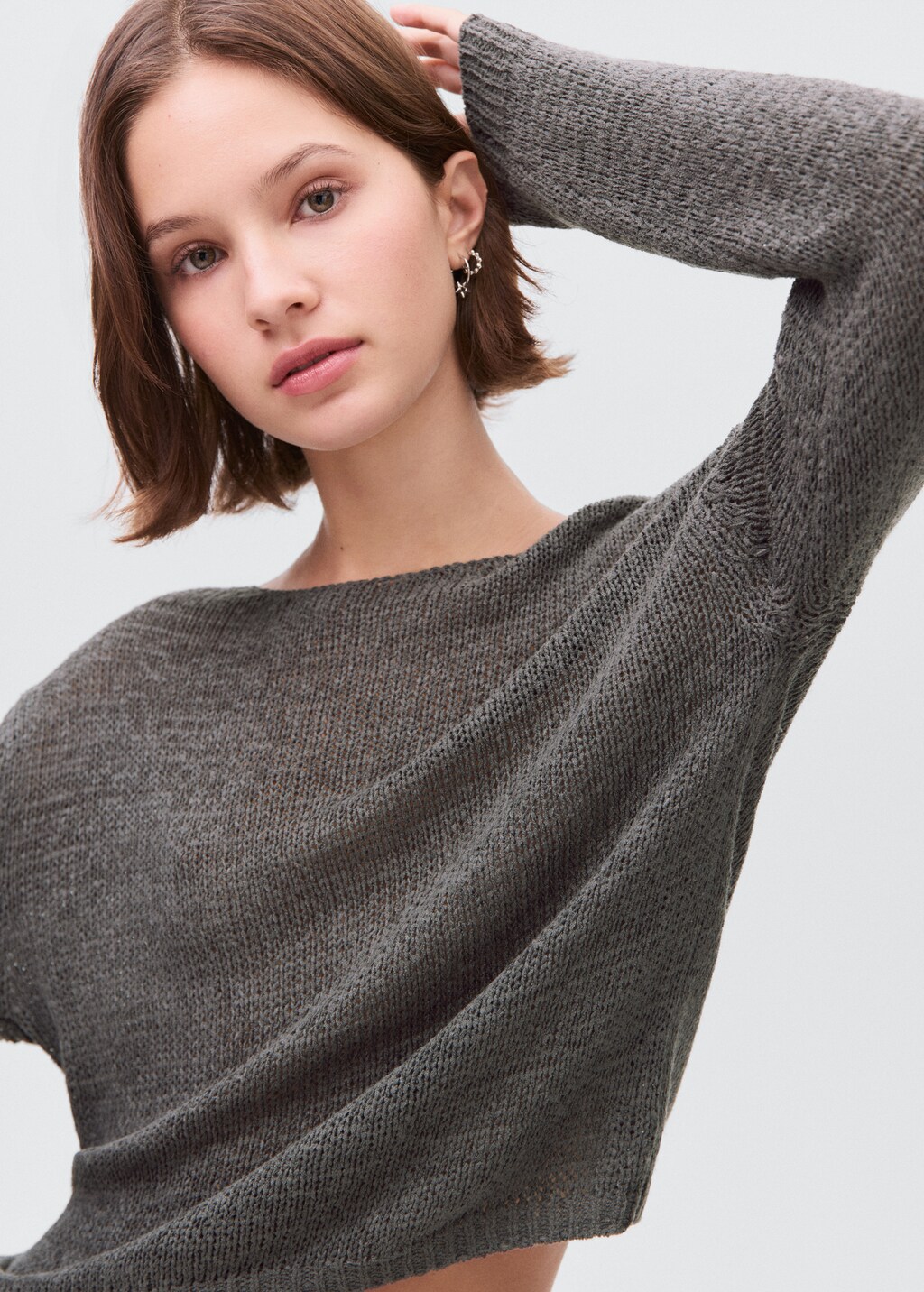 Knit sweater with lace pattern