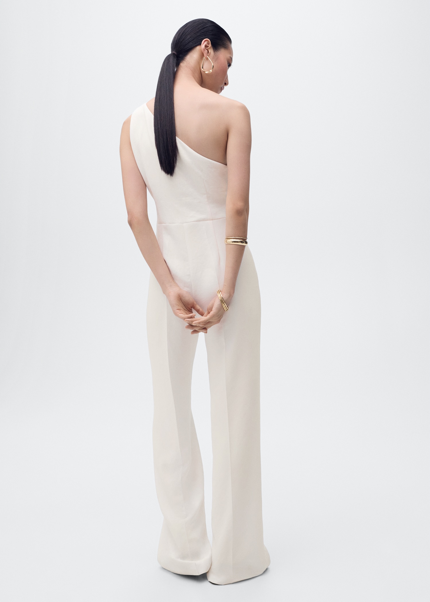 Long jumpsuit with asymmetrical neck - Reverse of the article