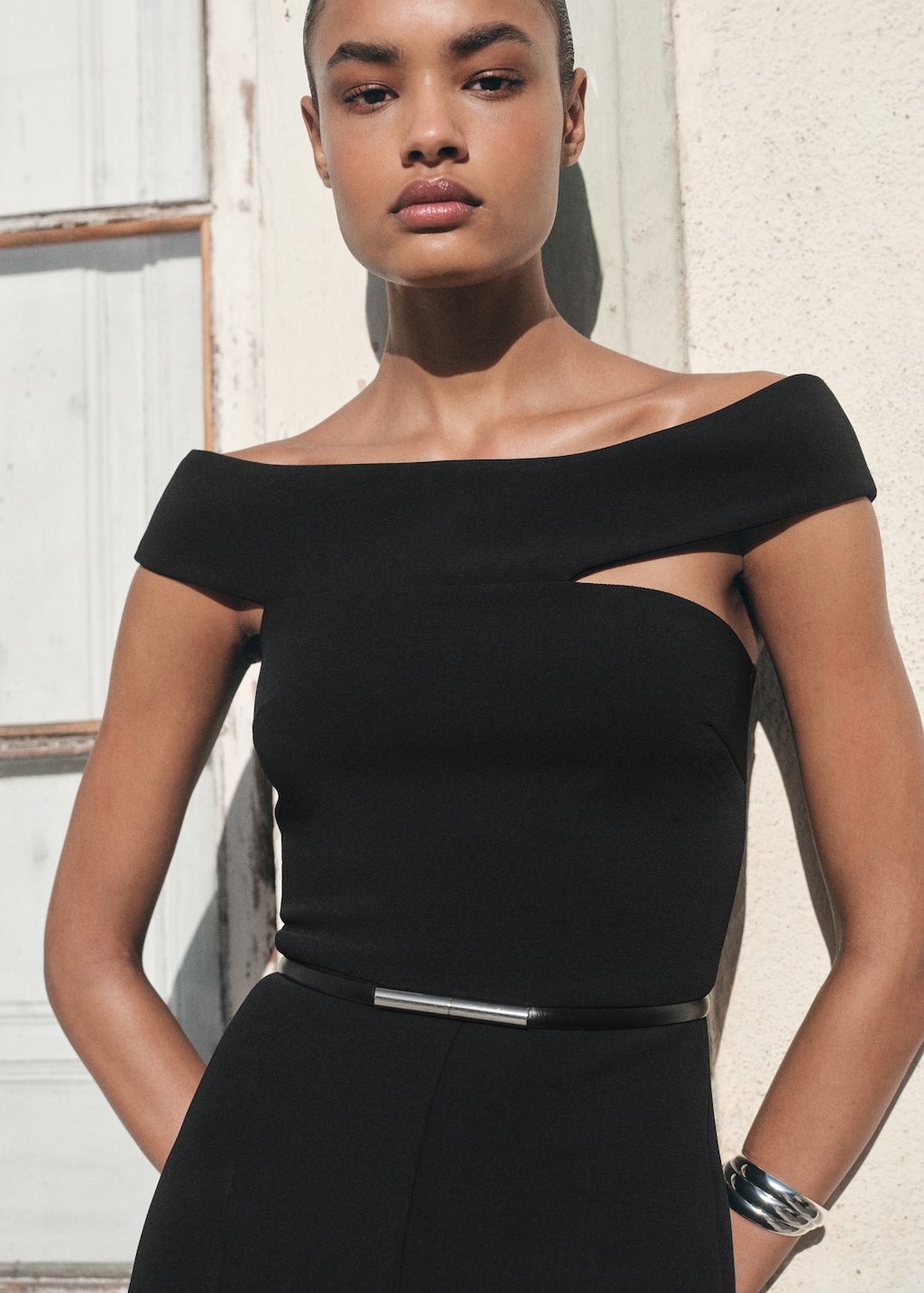 Long jumpsuit with asymmetrical neck