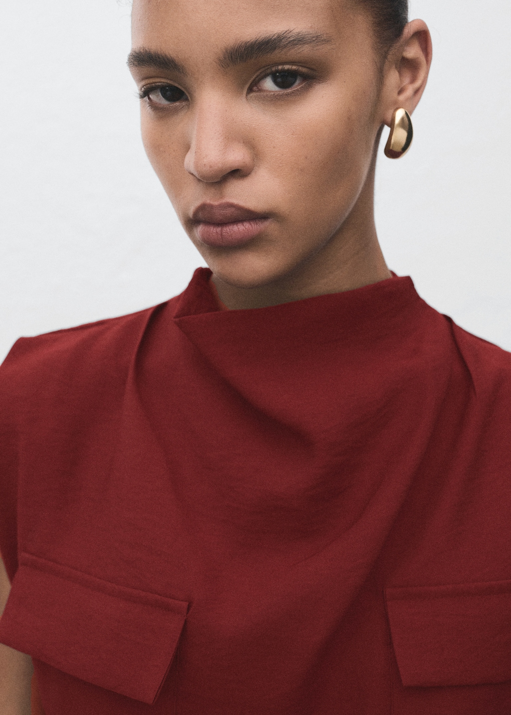 Blouse with draped neck and belt