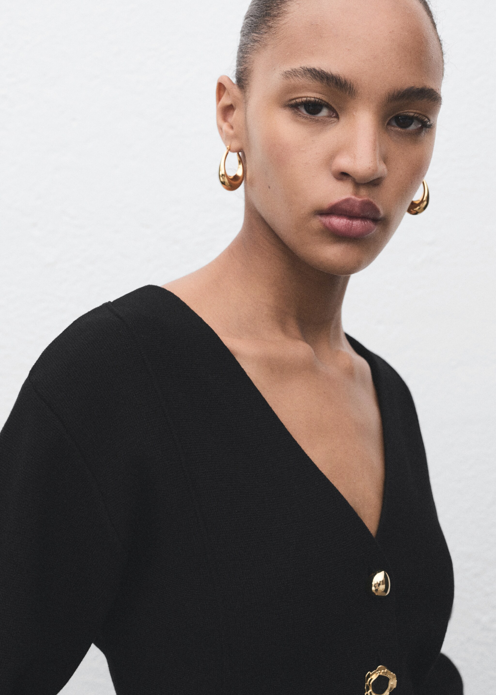 Knitted jacket with jewel buttons - Details of the article 1