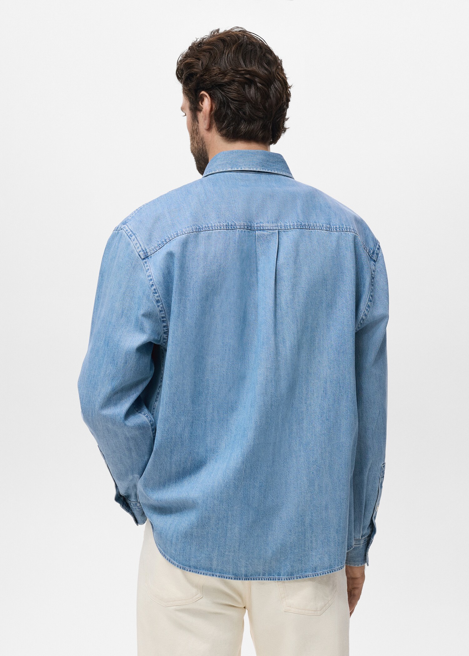 Denim overshirt with pocket - Reverse of the article