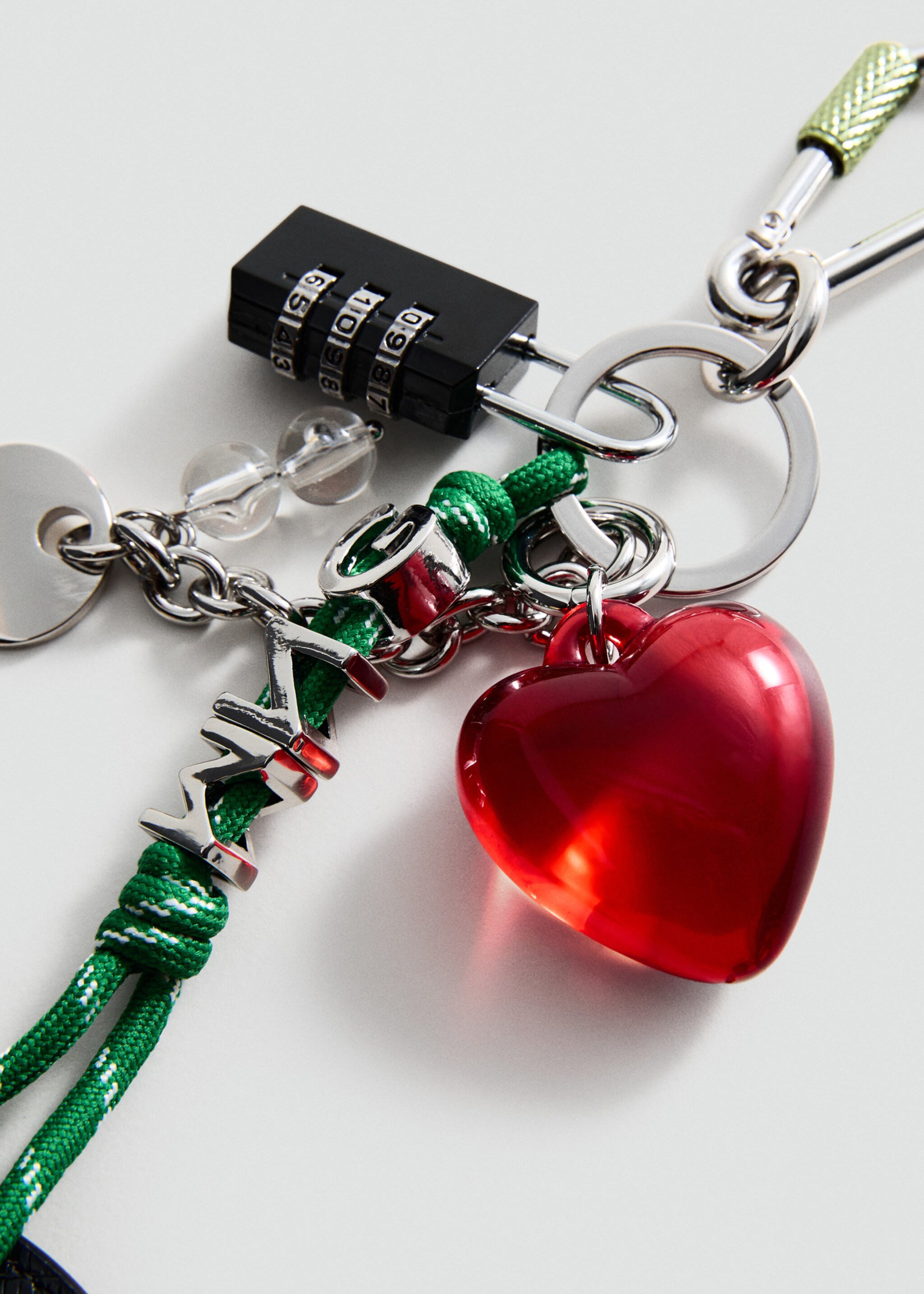 Multi-charm mirror keyring - Medium plane, Green. Ref: 17064442-00.