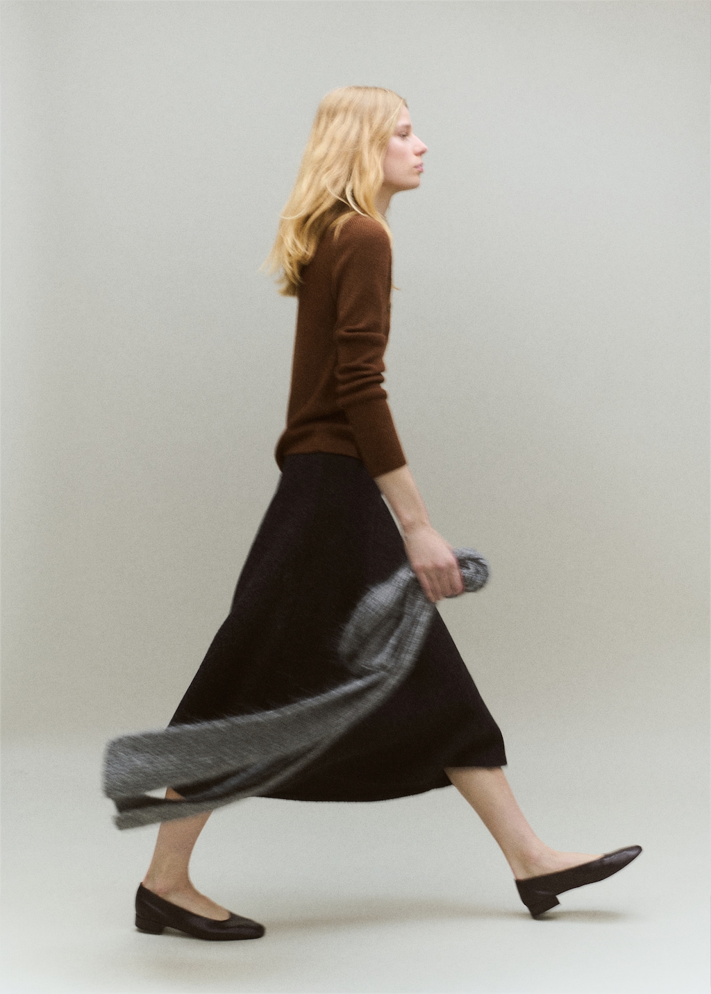 Sweater with asymmetrical neck and buttons