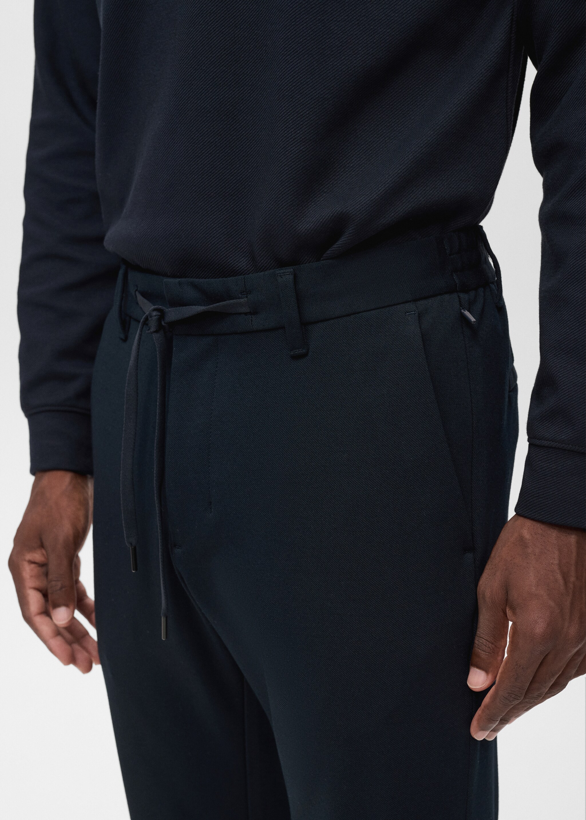 Stretch fabric slim-fit trousers with drawstring - Details of the article 1, Navy. Ref: 17066326-00.