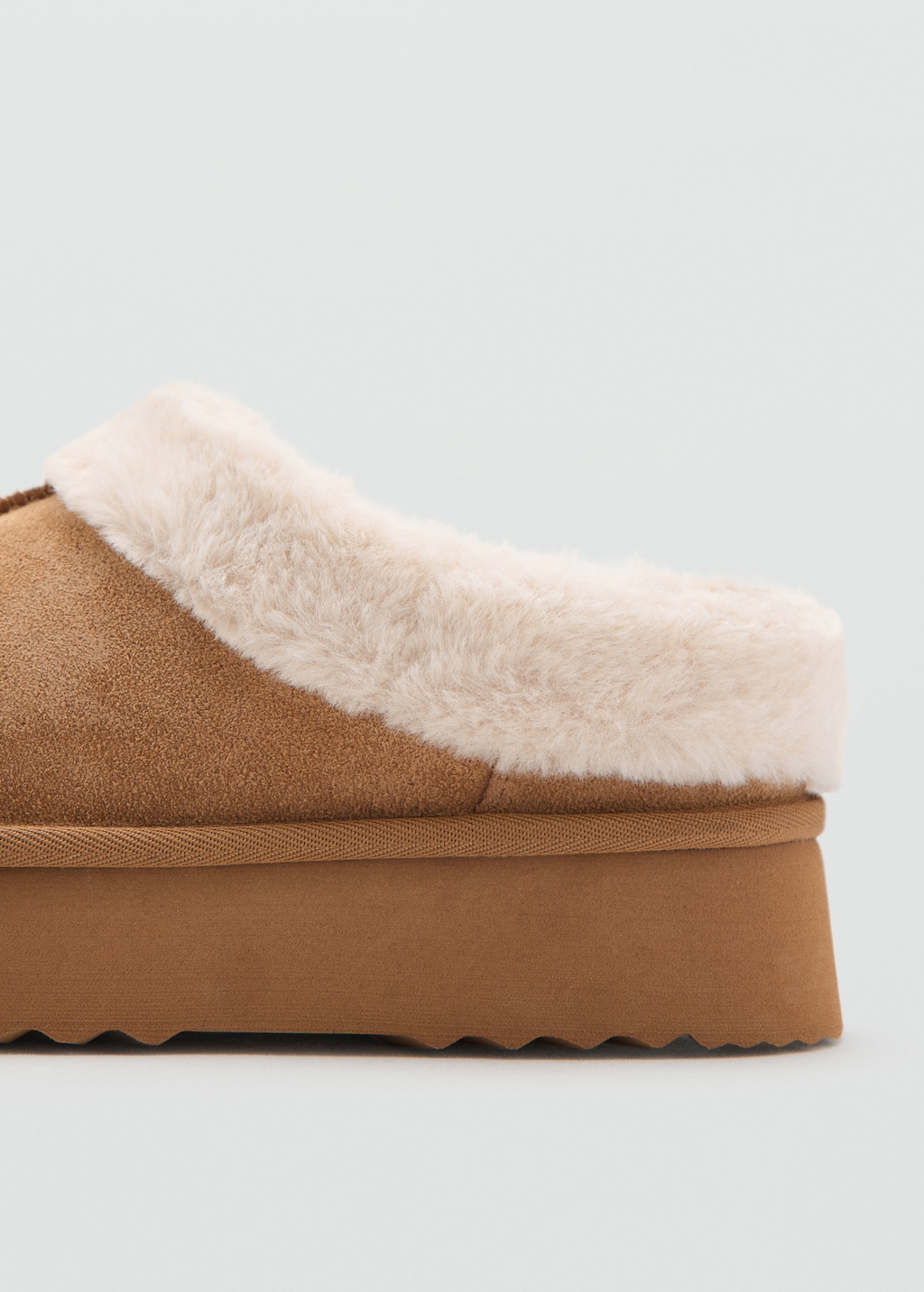 Platform clogs with sheepskin lining