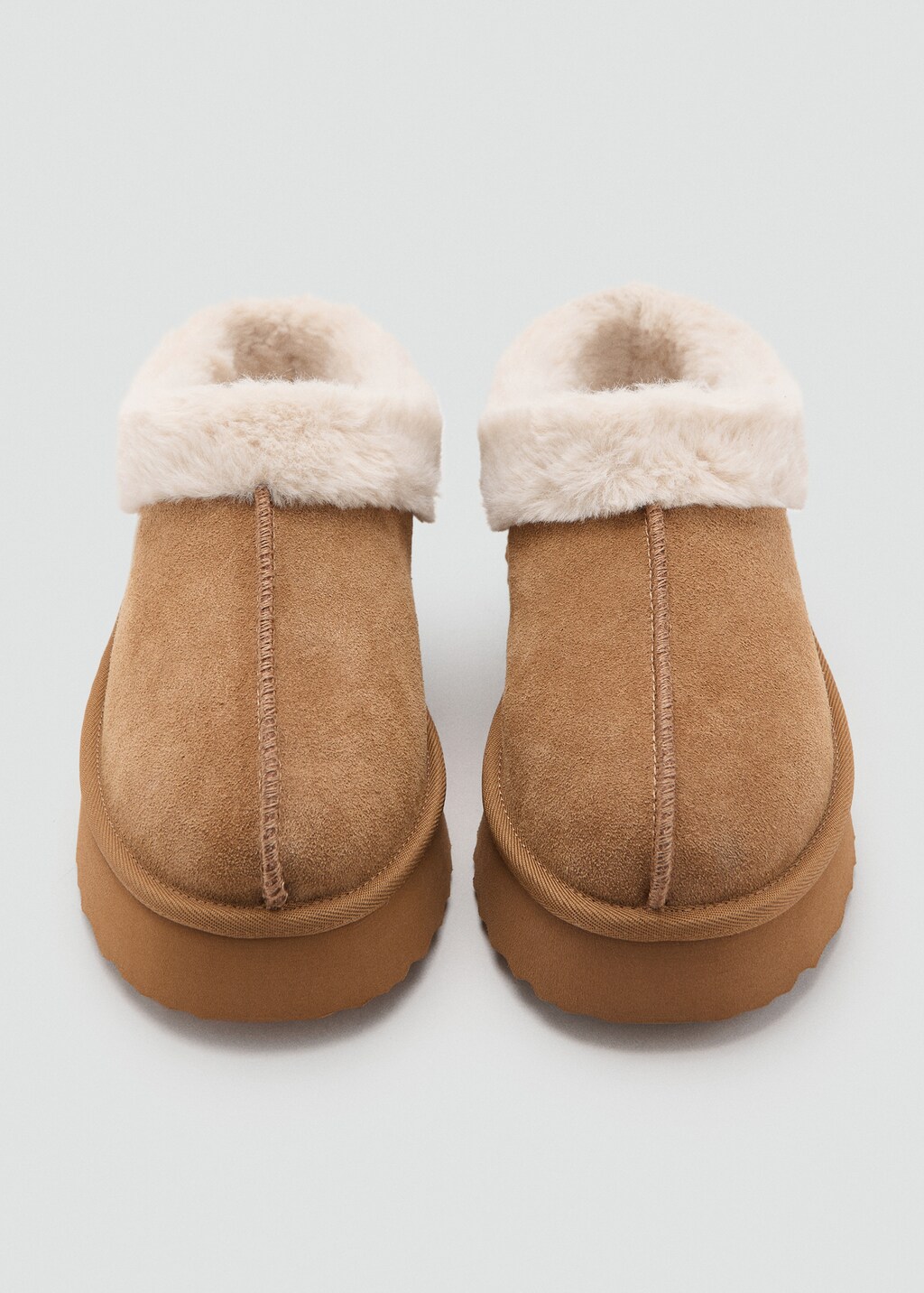 Platform clogs with sheepskin lining