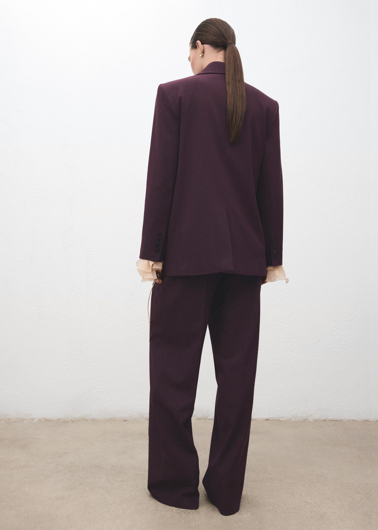 Wide-leg mid-rise pleated trousers - Reverse of the article