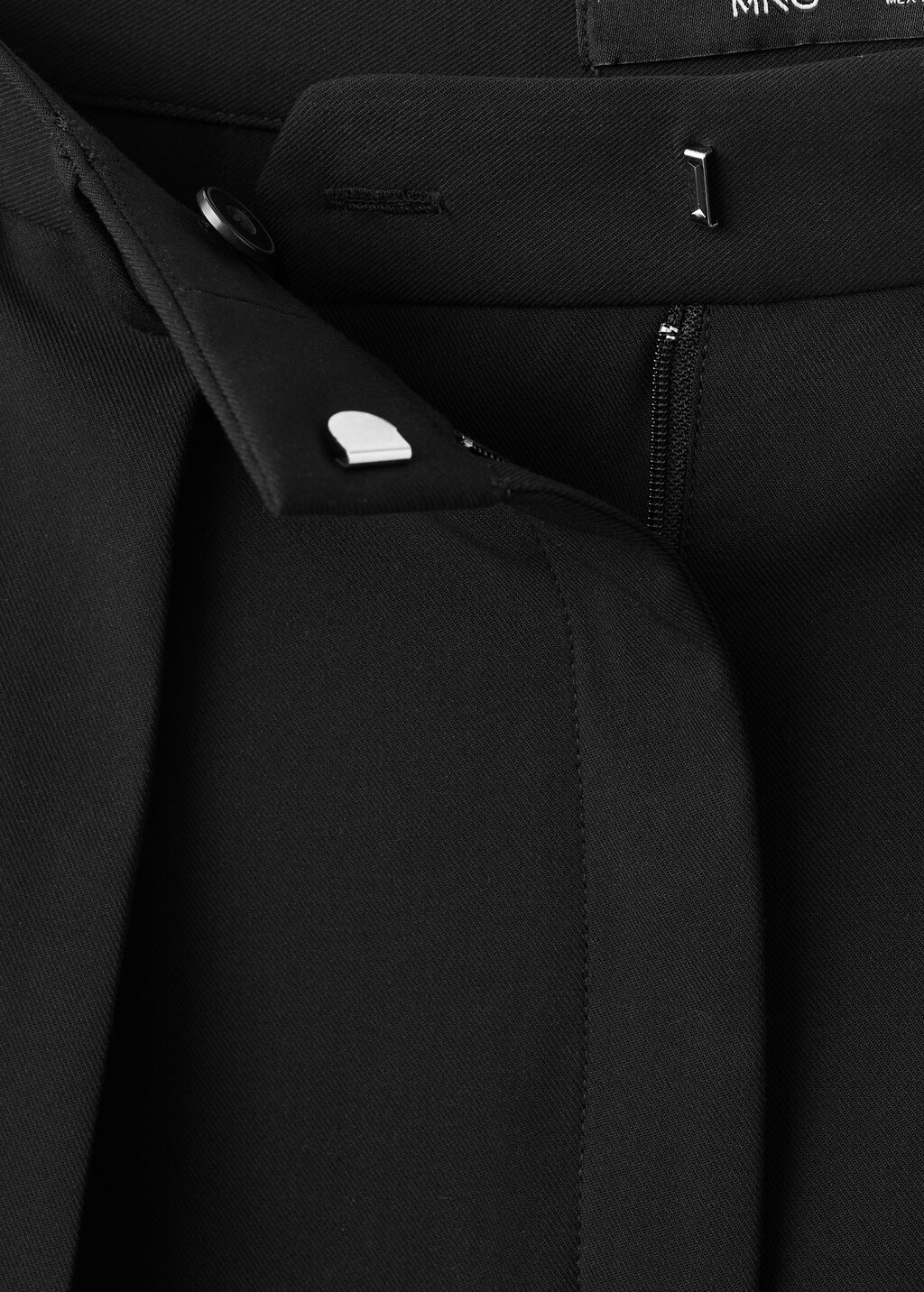 Wide-leg mid-rise pleated pants