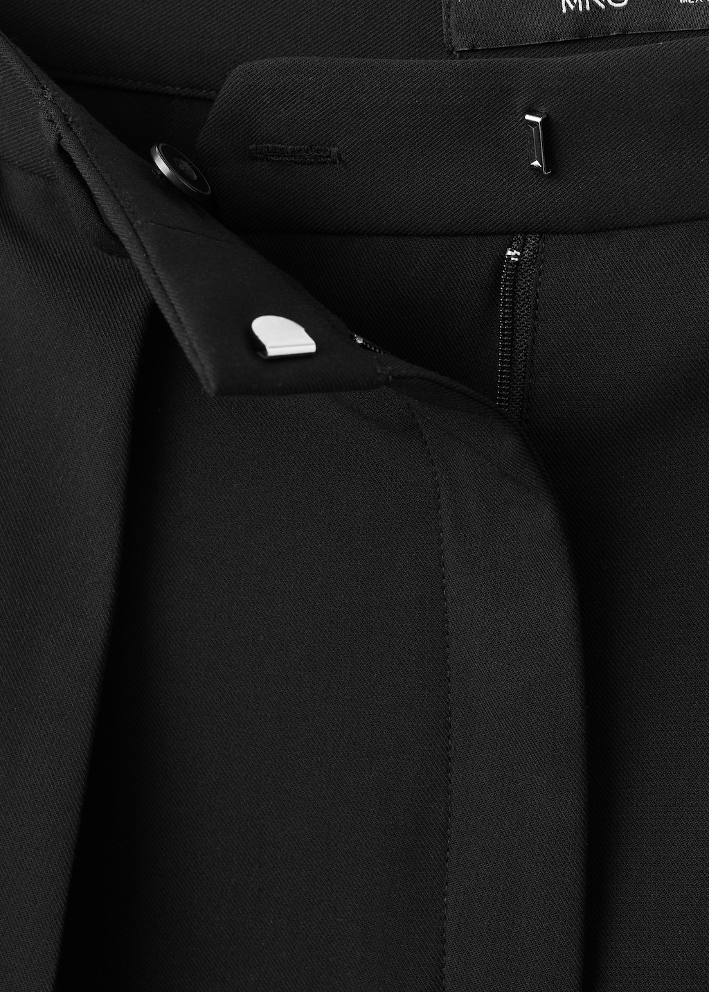 Wide-leg mid-rise pleated pants