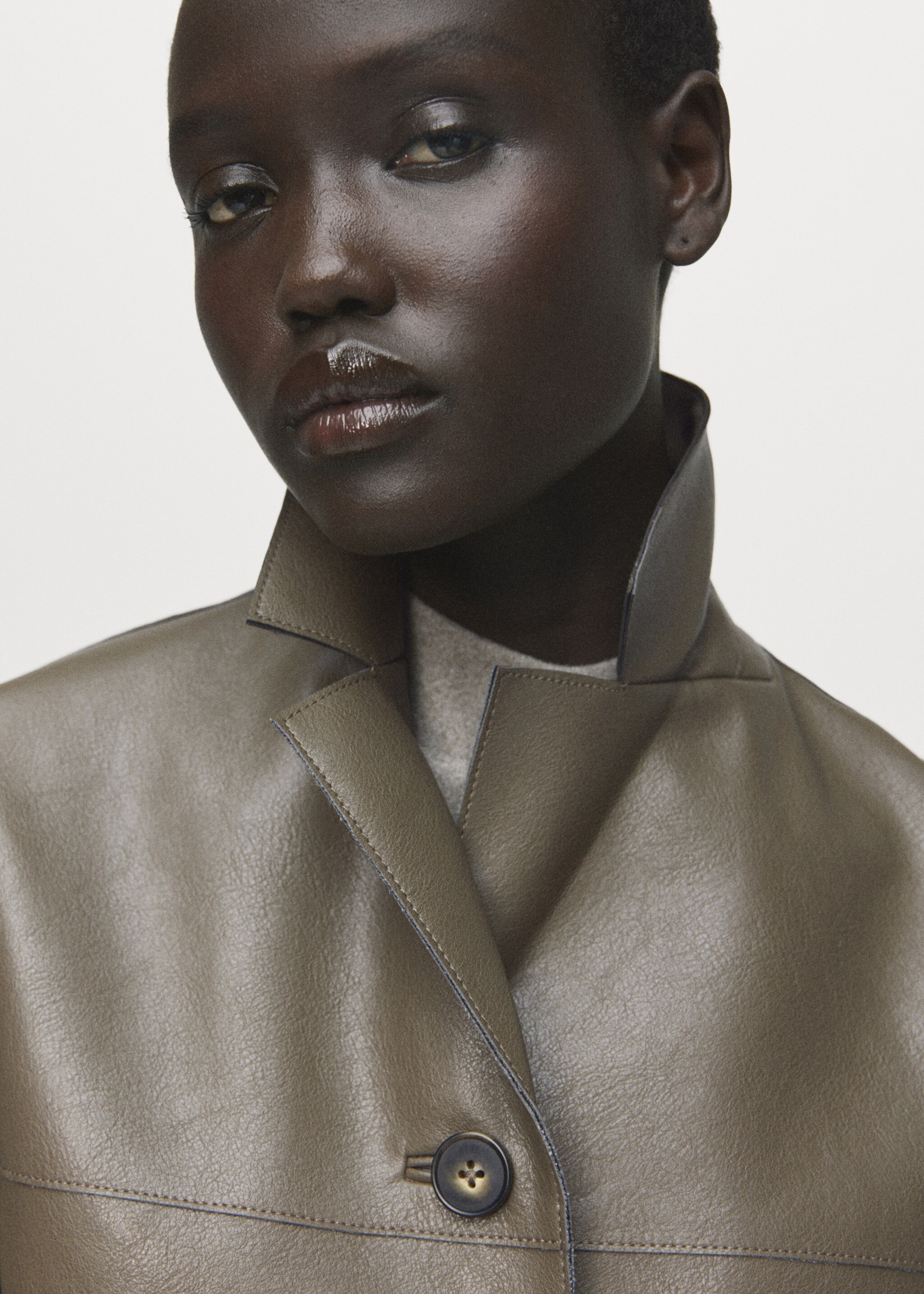 Leather-effect jacket with pockets - Details of the article 1, Olive Green. Ref: 17068288-00.