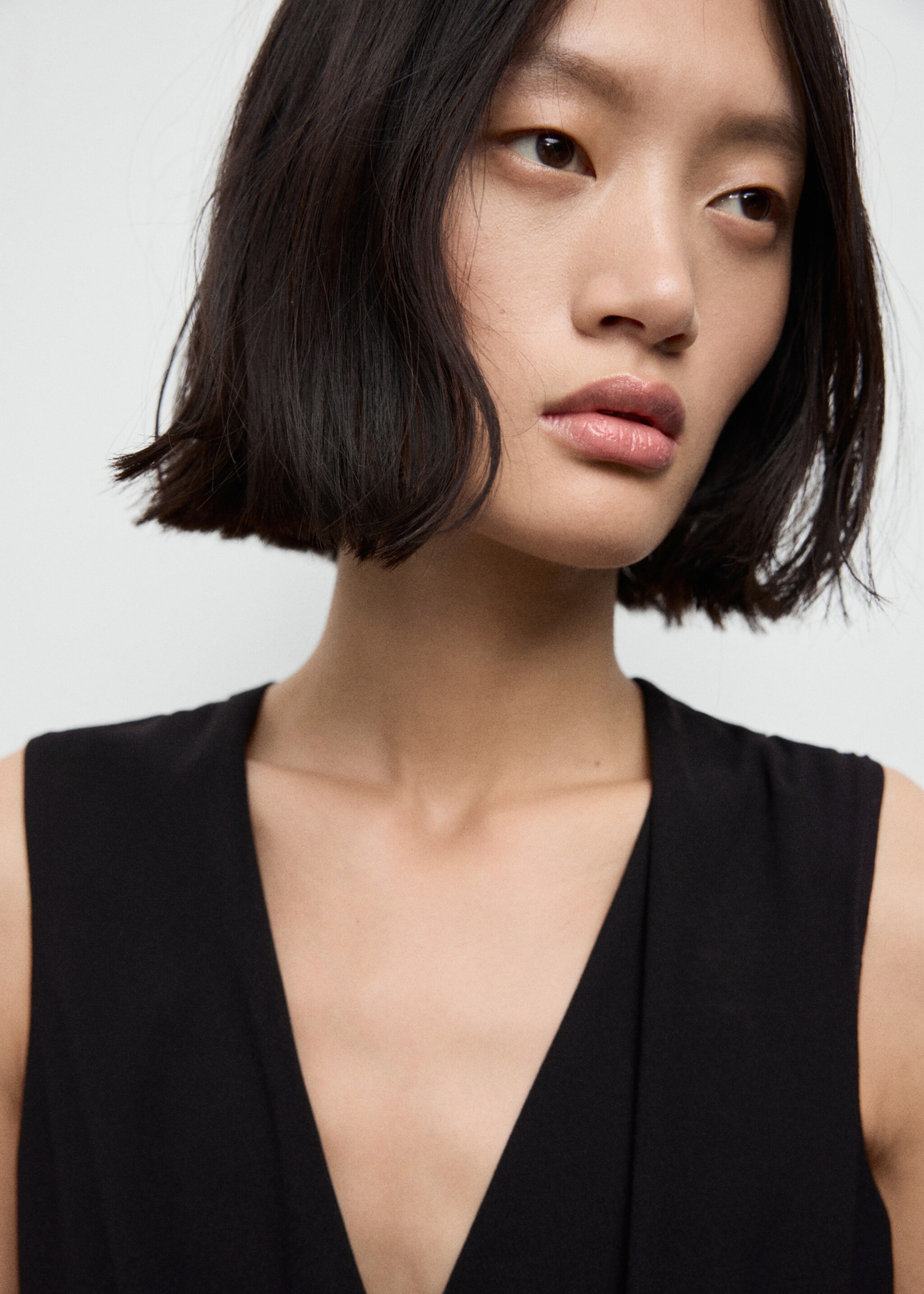 Belt wrap jumpsuit - Details of the article 1, Black. Ref: 17068292-00.