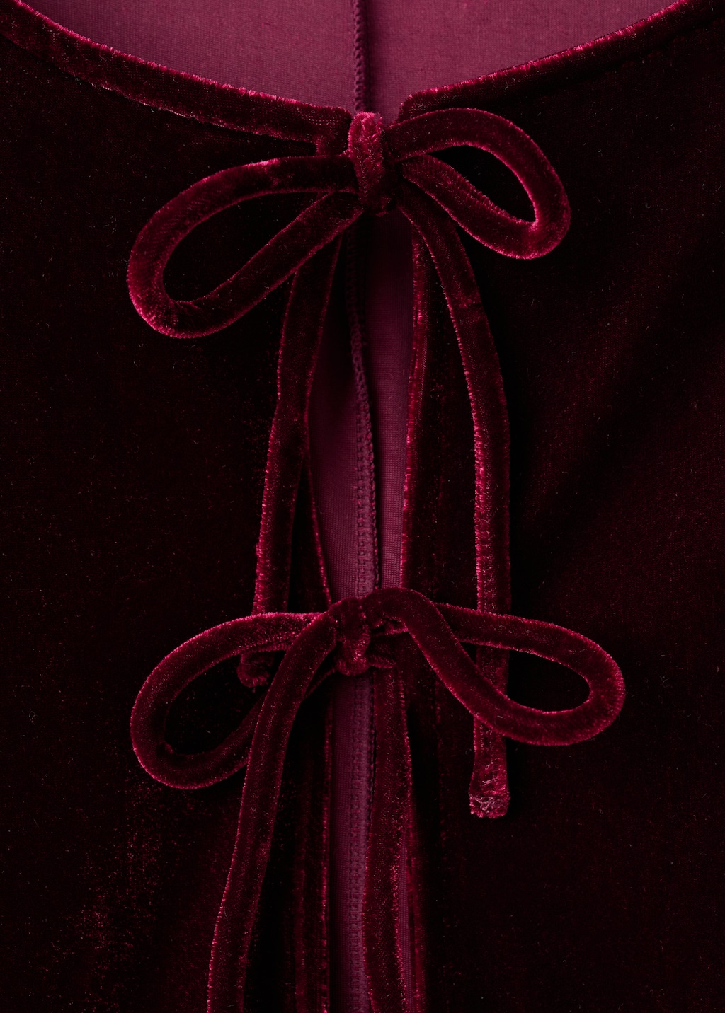 Velvet blouse with bows