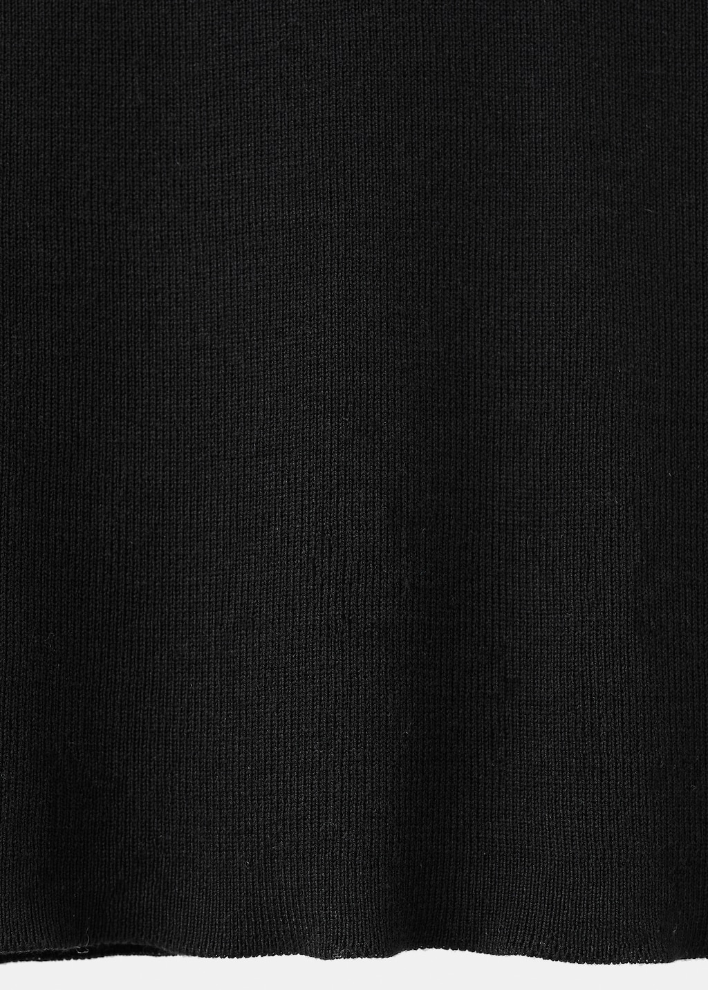 Knitted top with metallic flower