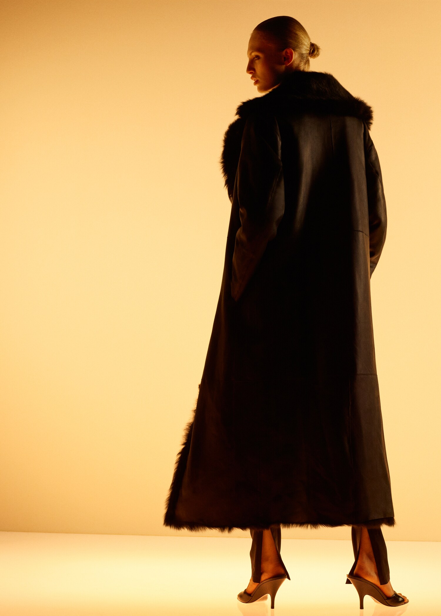 Manteau cuir imitation fourrure réversible - Verso de l’article