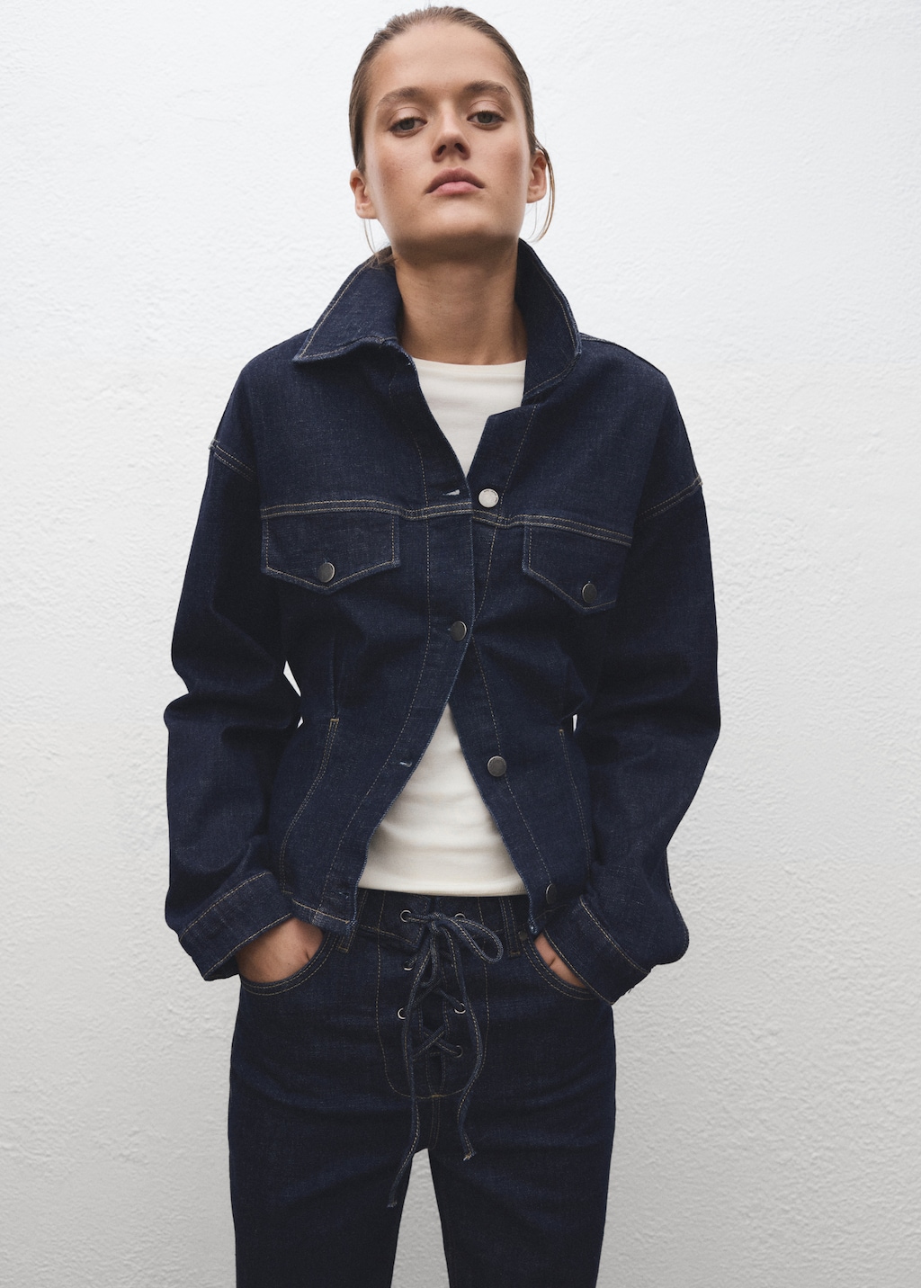 Fitted denim jacket with pockets
