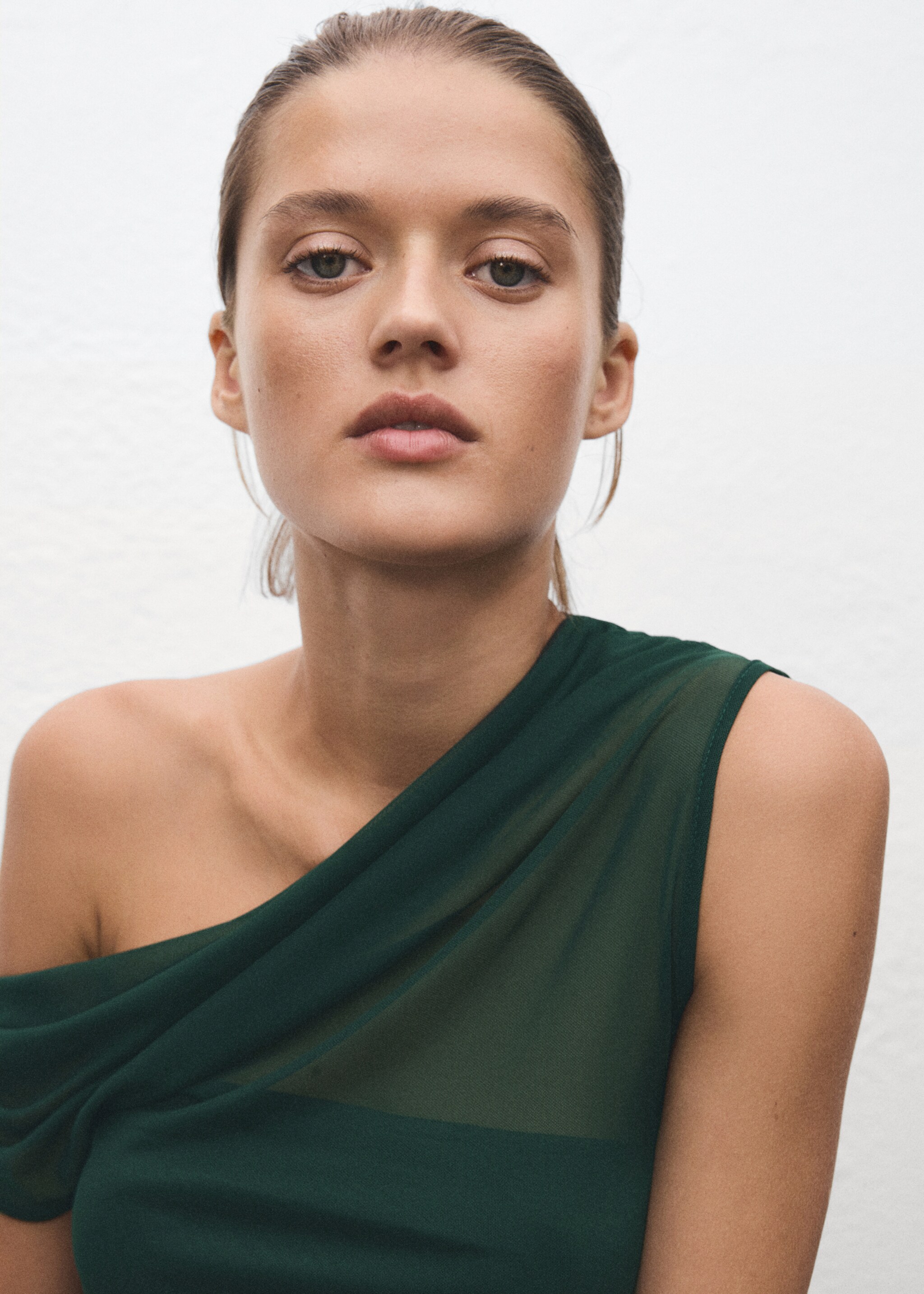 Semi-transparent top with asymmetrical neckline - Details of the article 1, Green. Ref: 17069212-00.