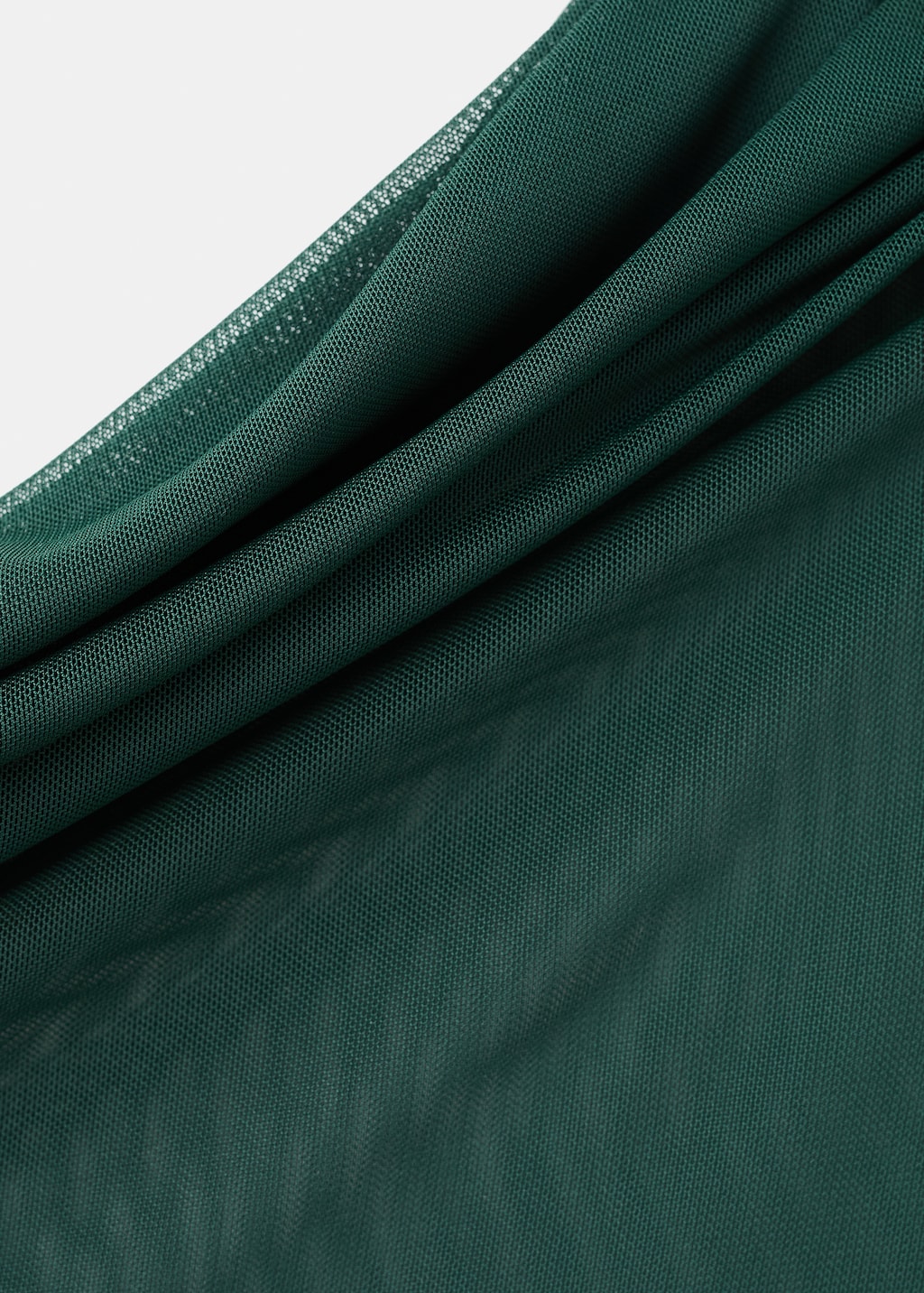 Semi-transparent top with asymmetrical neckline