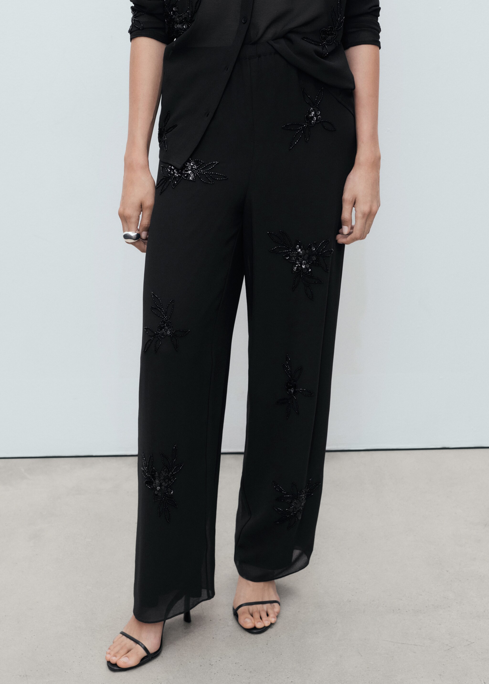 Rhinestone-embroidered trousers - Medium plane