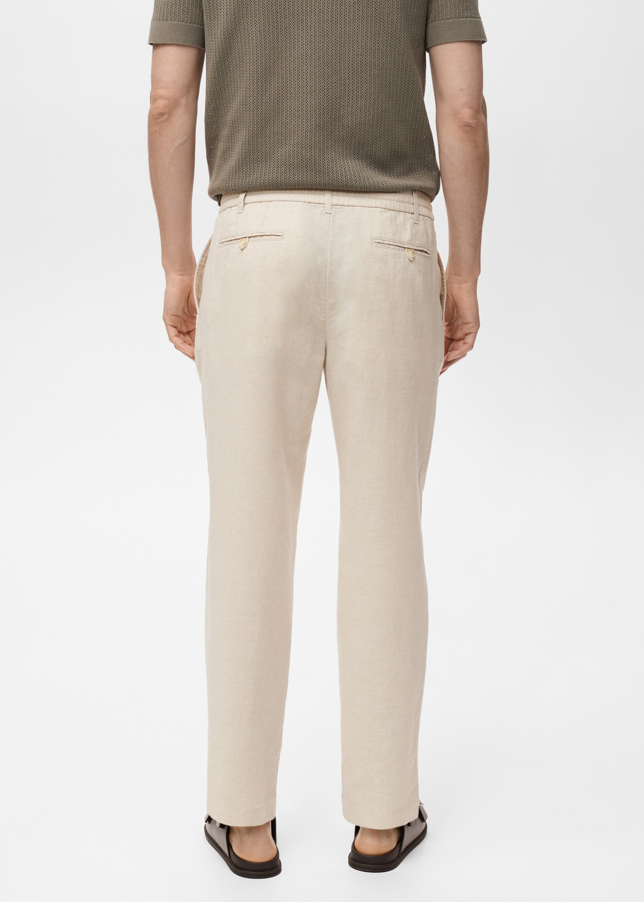 Slim-fit trousers with drawstring - Reverse of the article