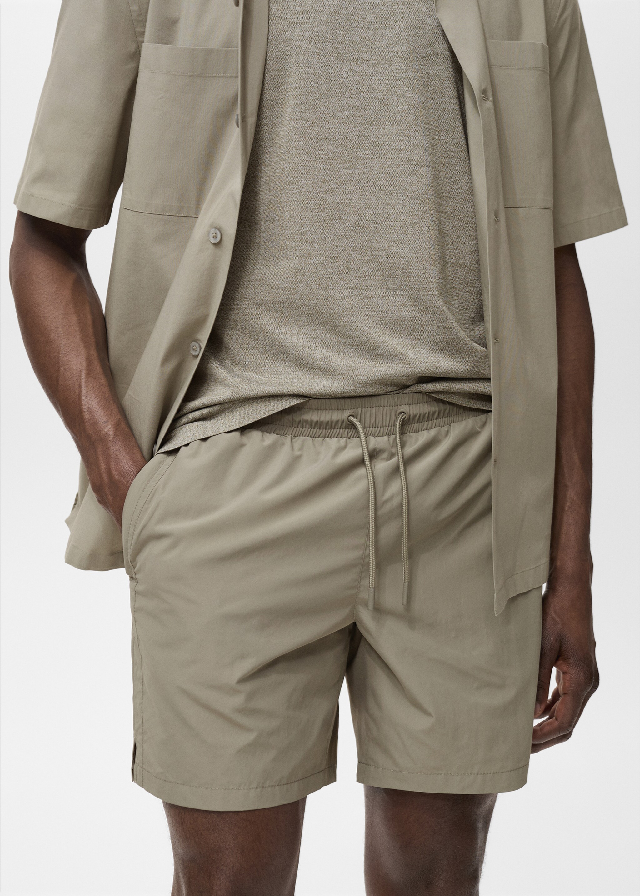 Swimsuit with zip pockets - Details of the article 1, Khaki. Ref: 17071146-00.