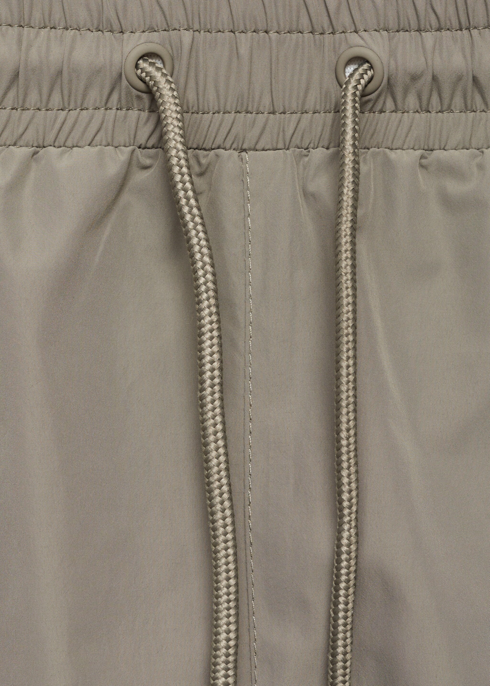 Swimsuit with zip pockets - Details of the article 8, Khaki. Ref: 17071146-00.