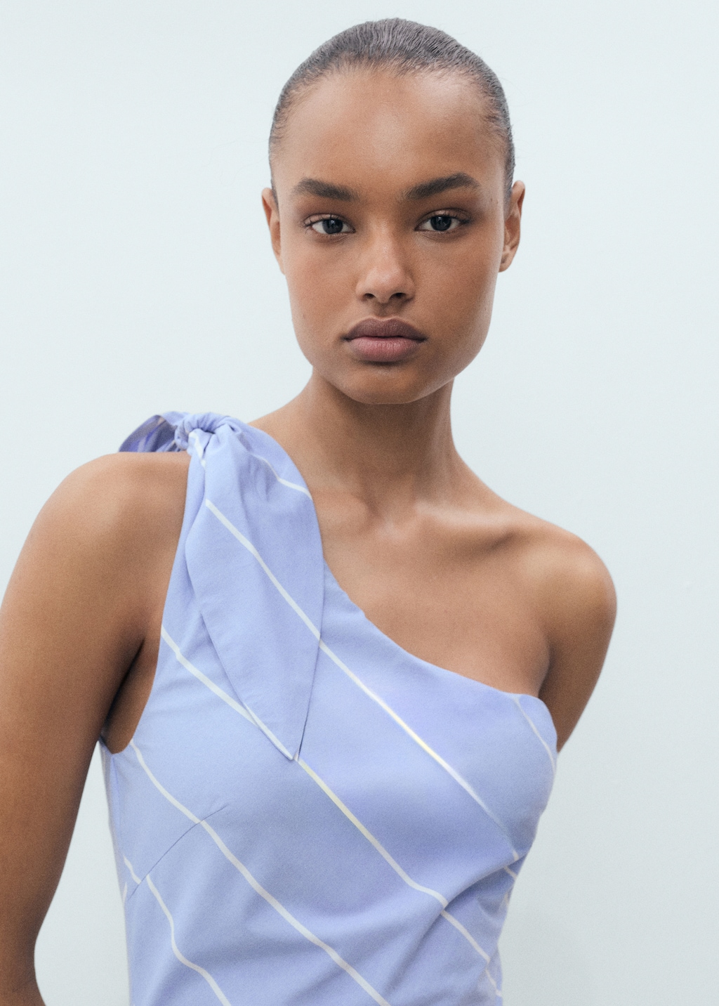 Asymmetrical striped dress with knot