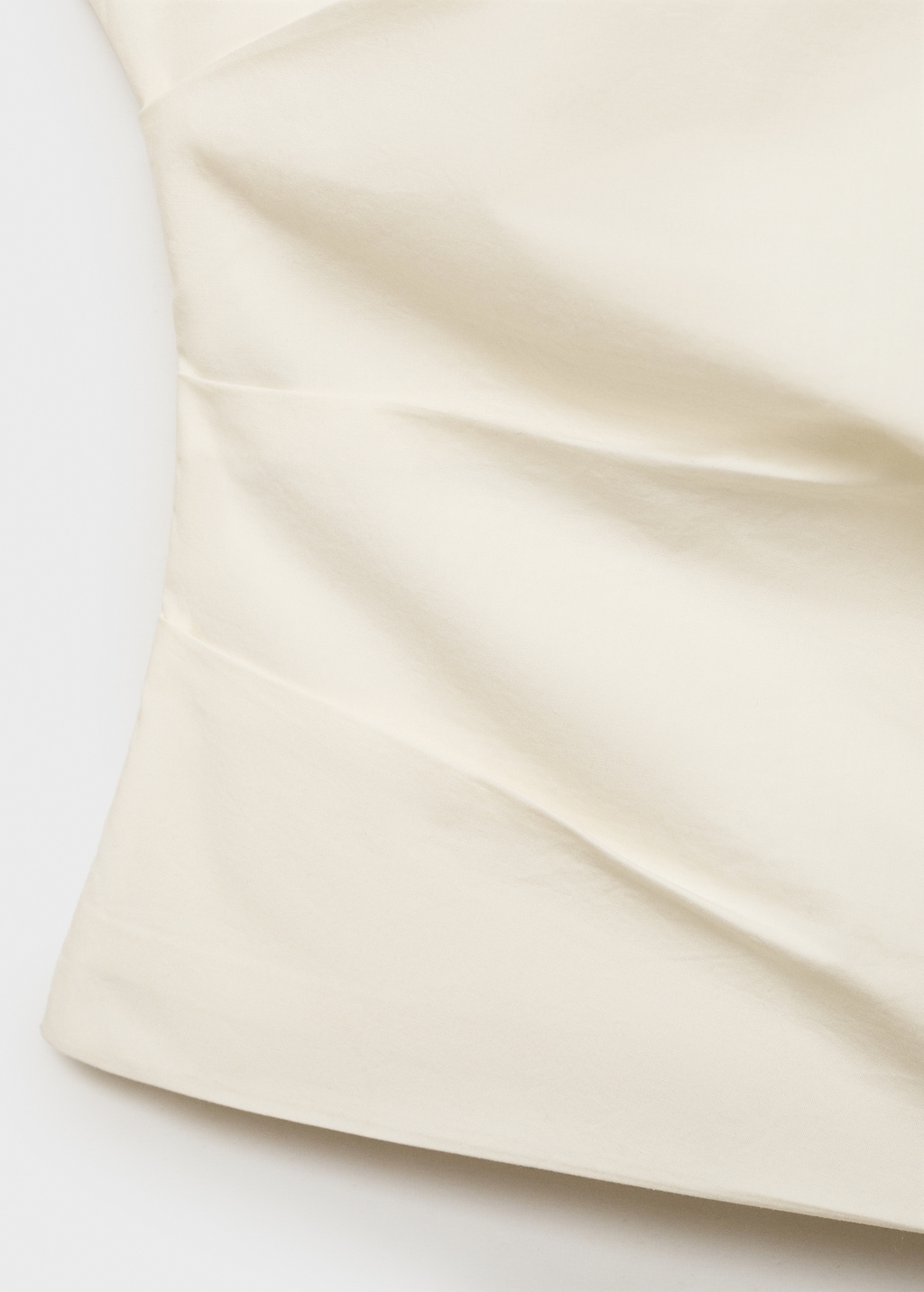 Asymmetrical flower-embroidered top