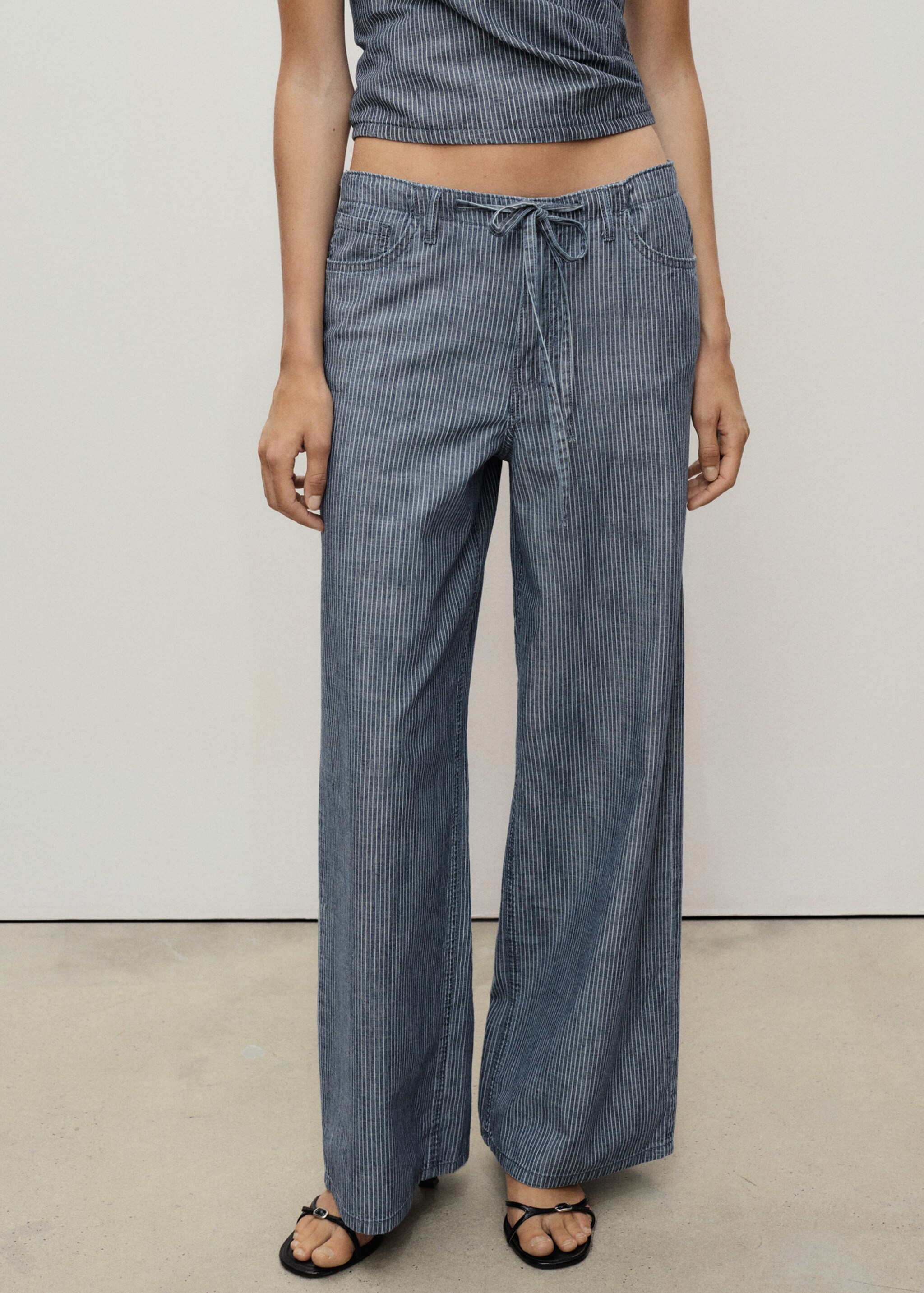Pantaloni denim wideleg cintura - Piano medio