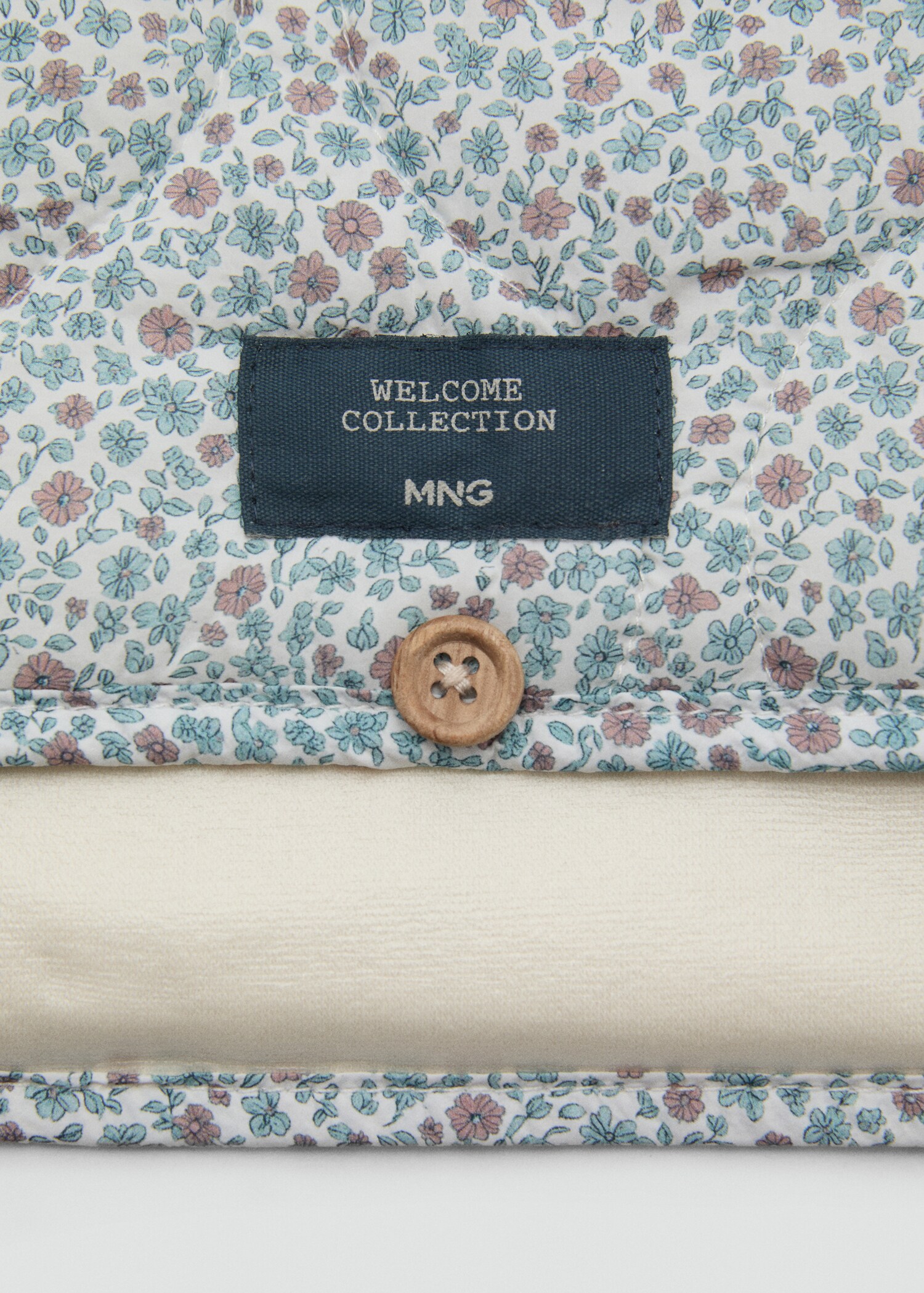 Blommigt skötunderlägg - Detaljer om artikeln 1