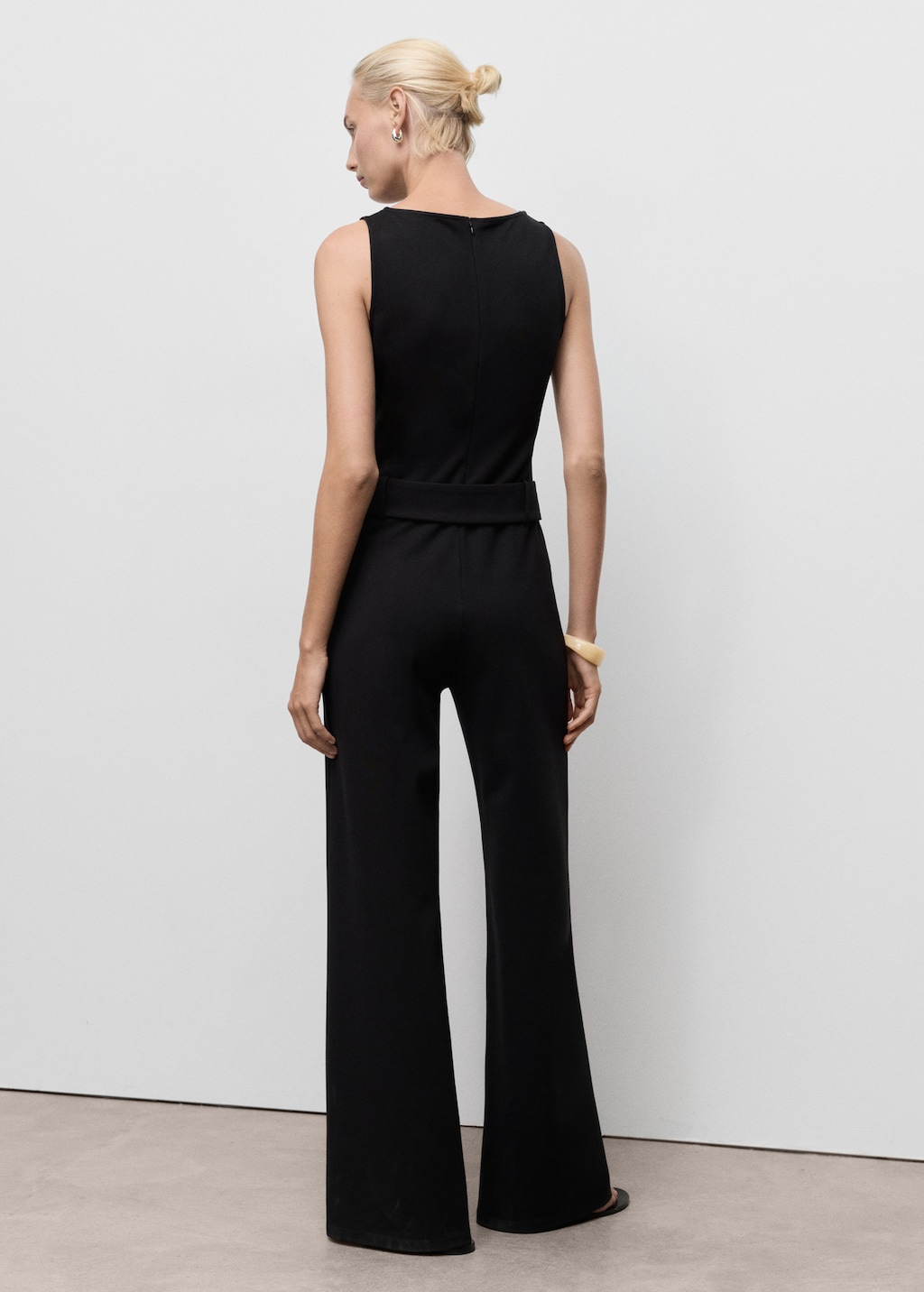 Long jumpsuit with belt and buckle