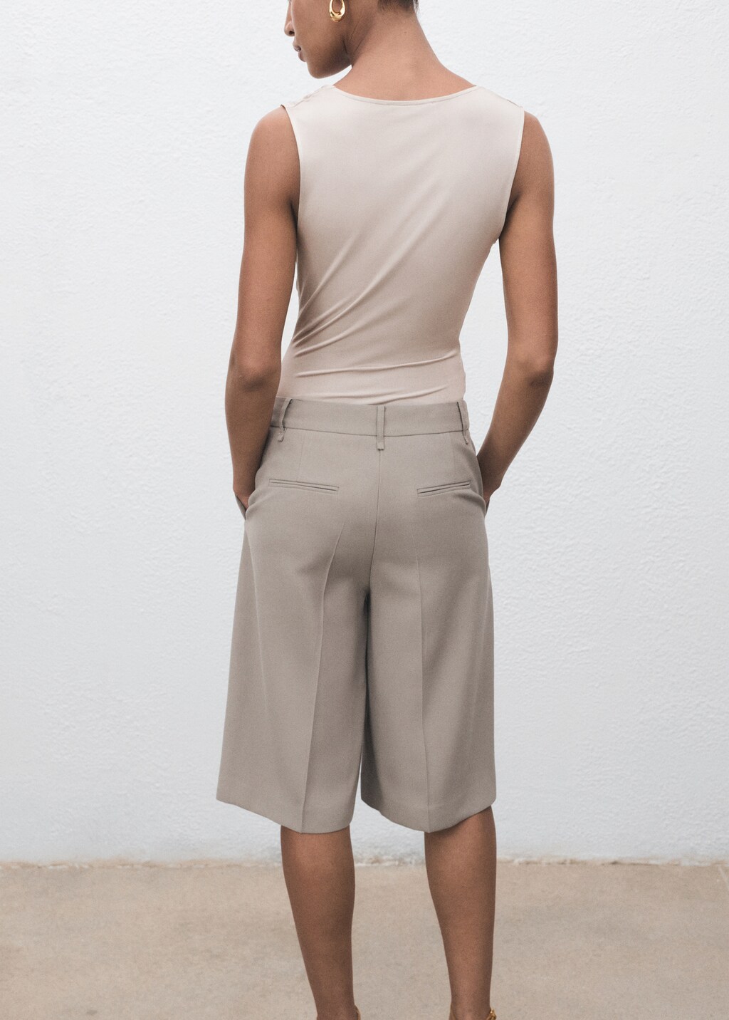 Bodysuit with draped neckline