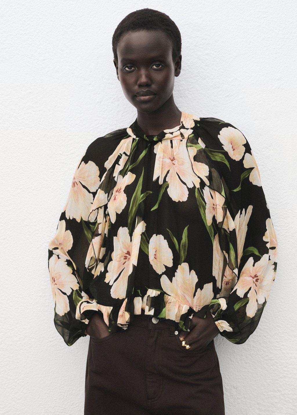 Semi-transparent floral blouse