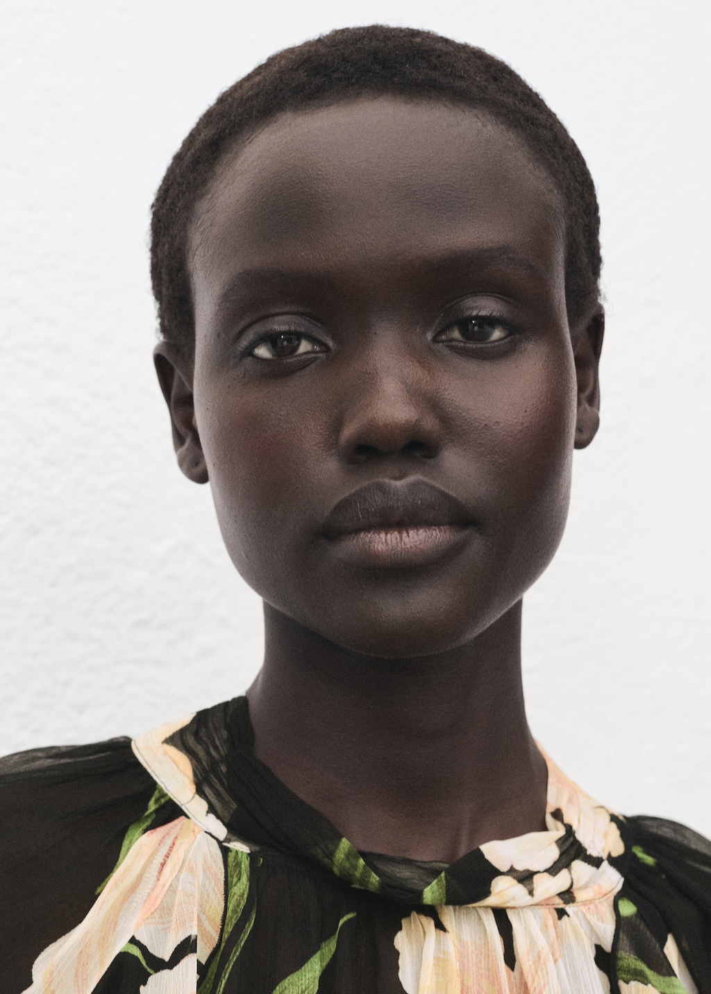 Semi-transparent floral blouse