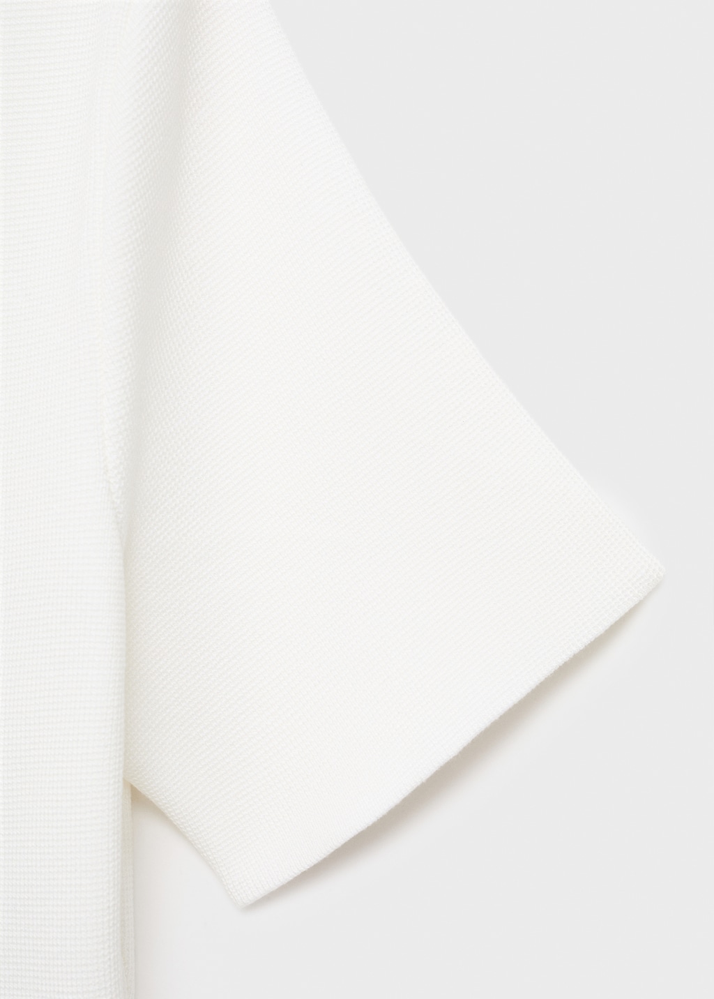 Knitted cardigan with jewel button