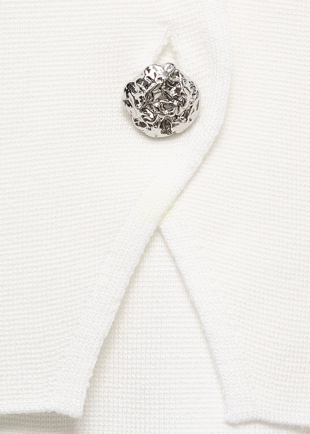 Knitted cardigan with jewel button